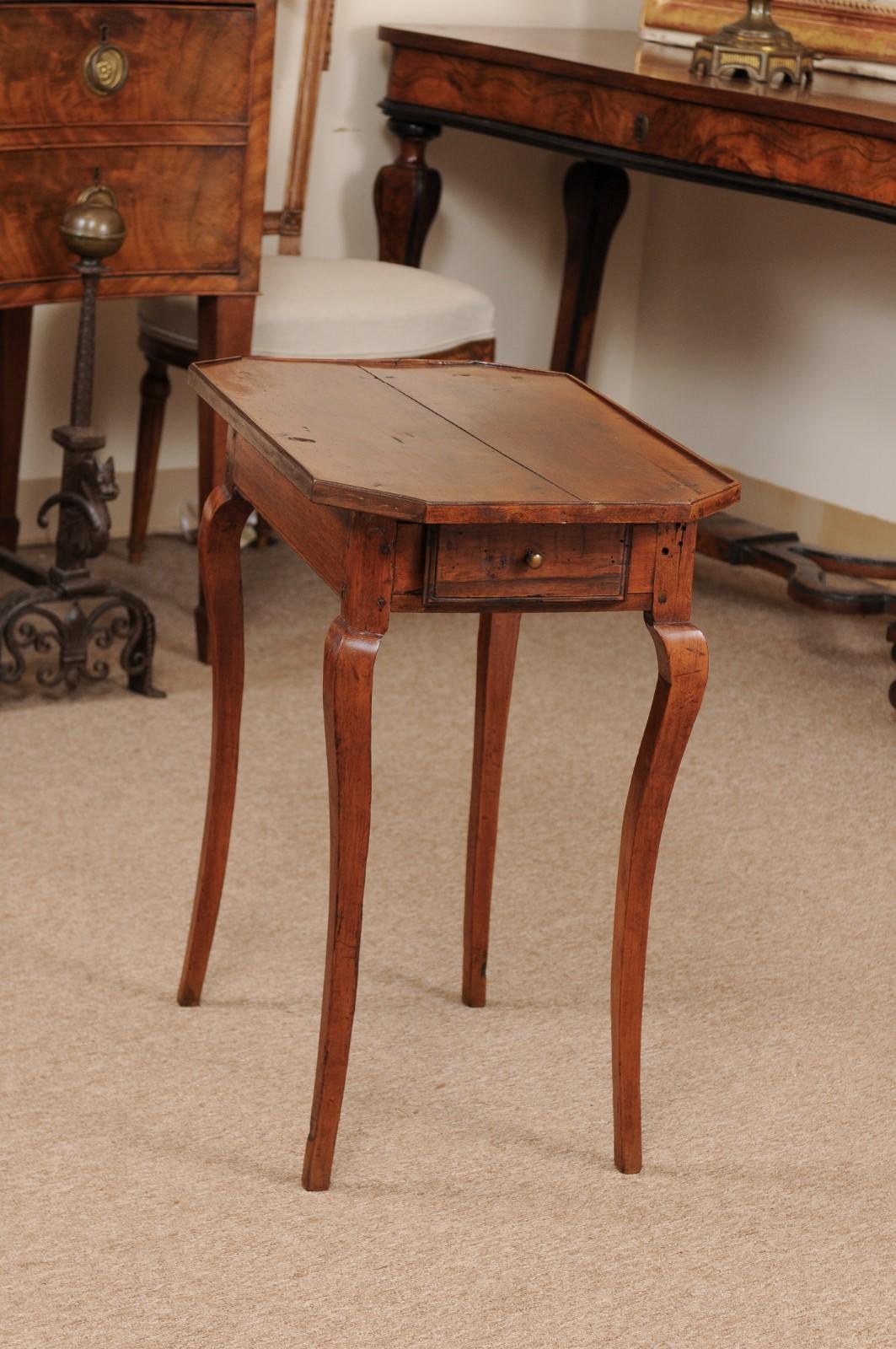 French Louis XV walnut side table with canted corners, drawer and cabriole legs.
