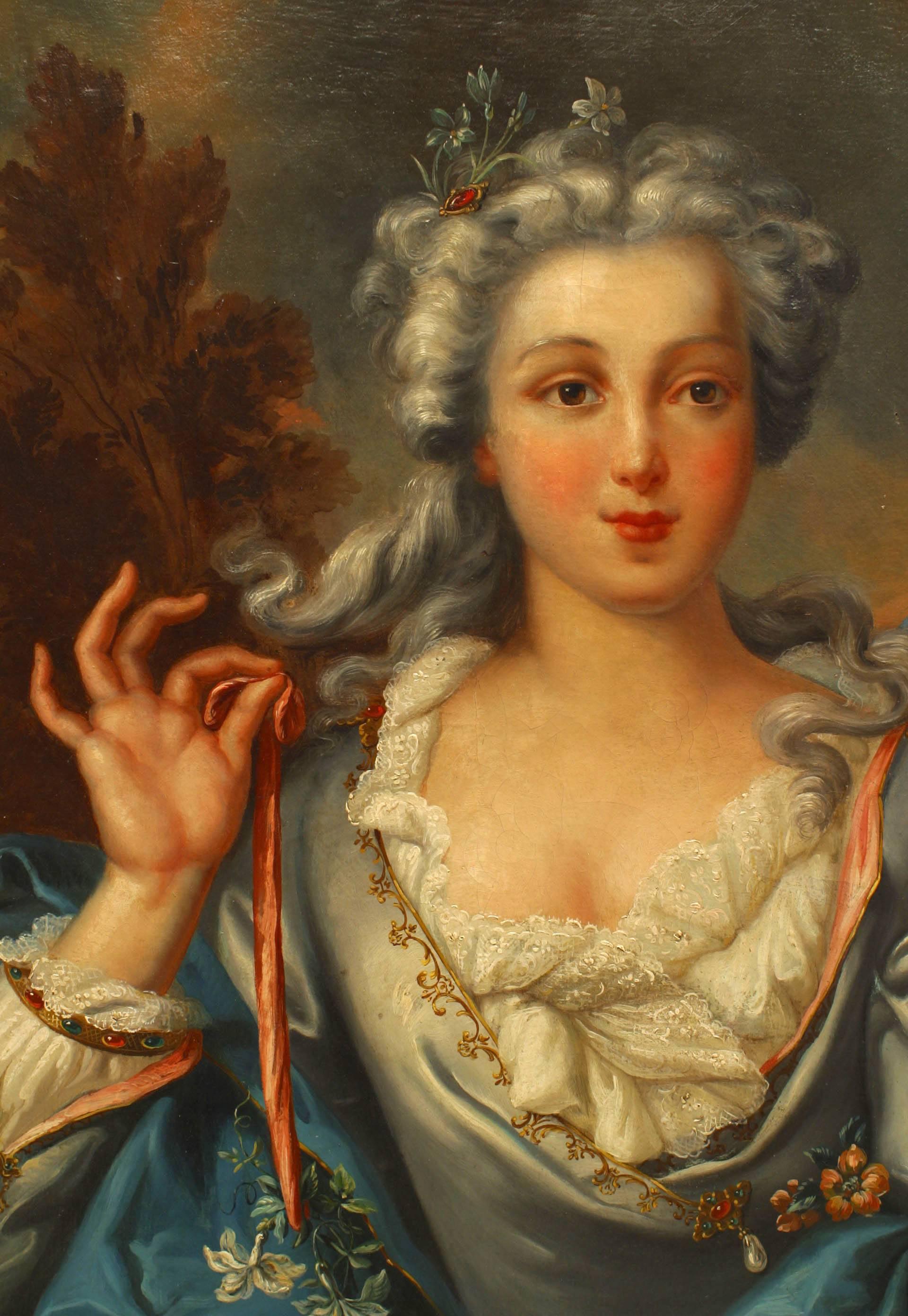 French Louis XVI (18/19th Cent) portrait oil painting of young woman wearing a blue dress holding a pink ribbon with flowers in her hair in a gold carved frame (style of NATTIER)
