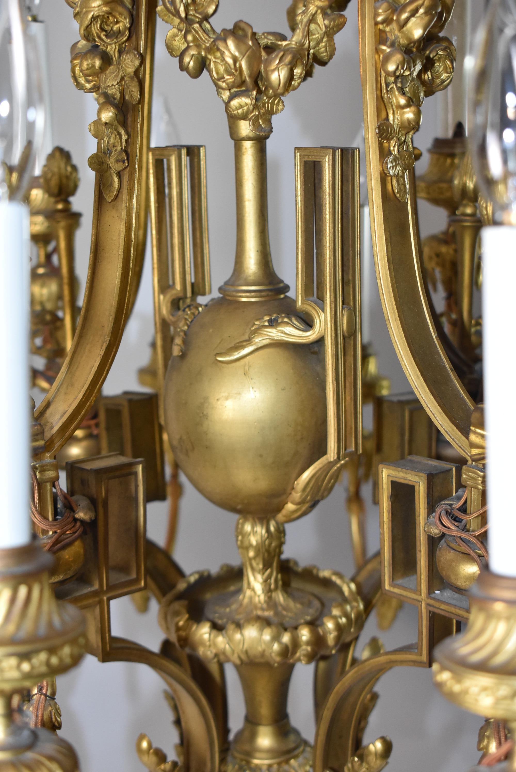 French Louis XVI Bronze Ormolu Four Arm 20 Light Chandelier In Good Condition For Sale In Toledo, OH