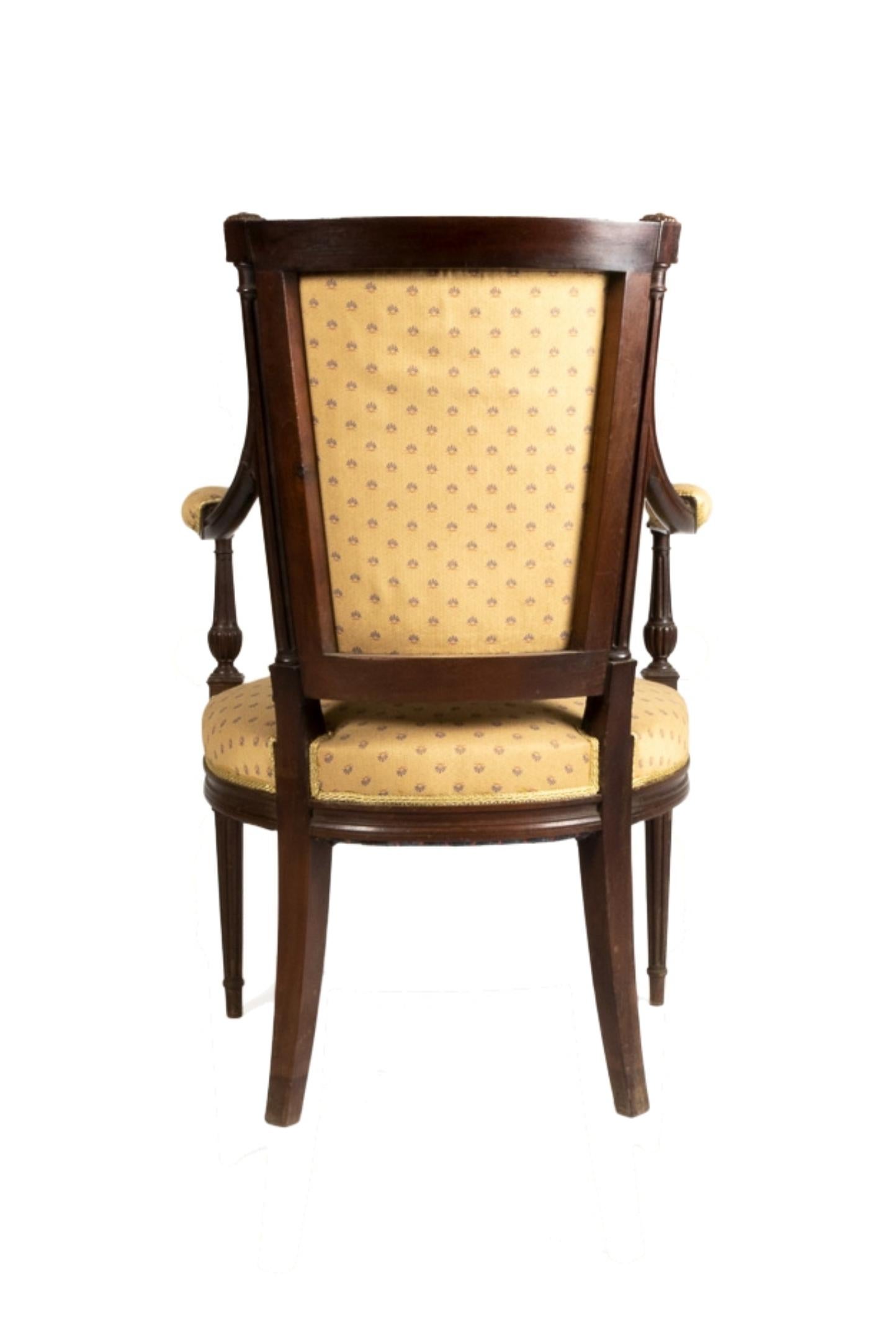 Louis XVI style salon suite: A five pieces with four armchairs and one canapé in “twisted rope” carving style.
Yellow upholstery with floral monogram. 
The structure was recently checked by a professional carpenter and has no issues. 