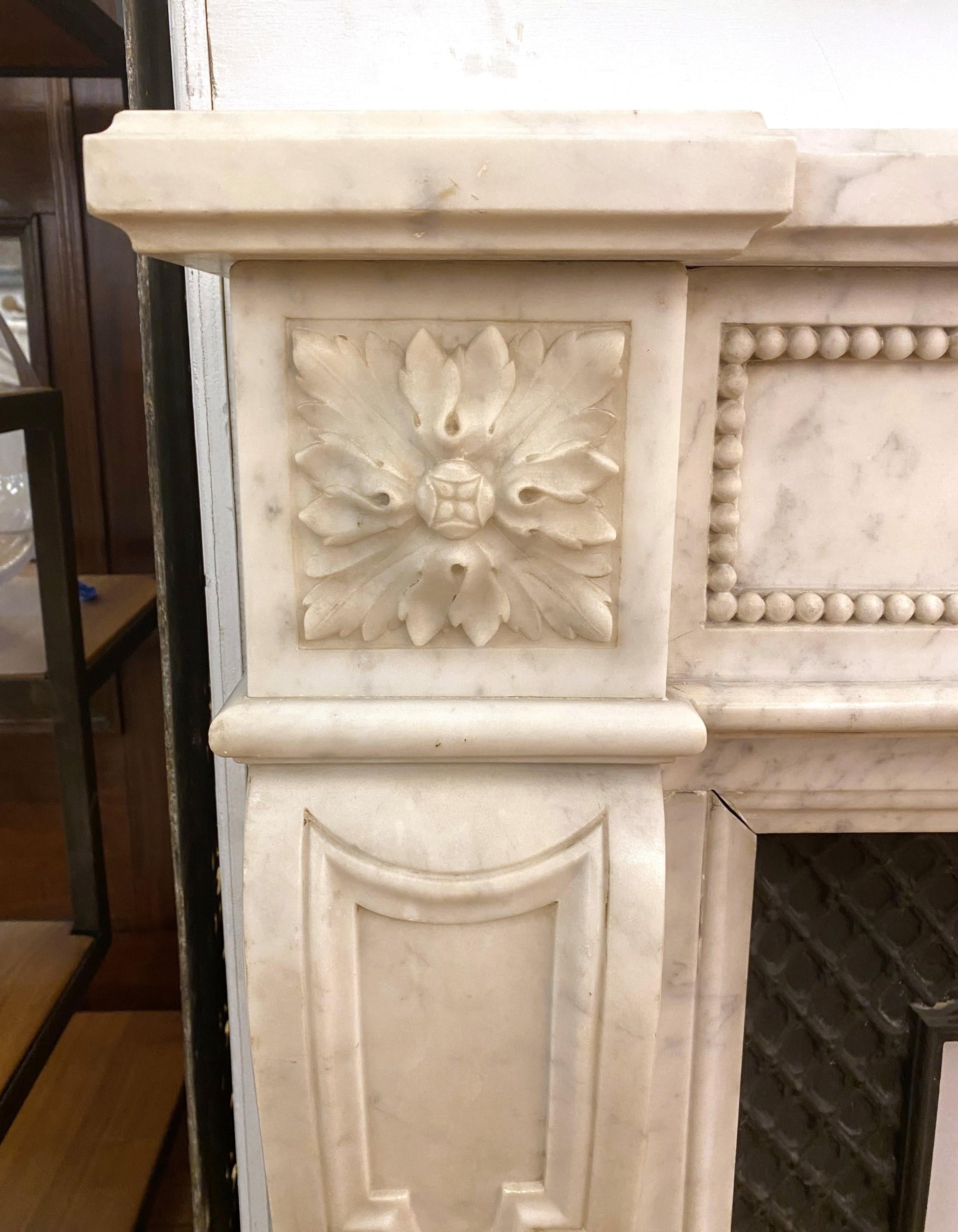 Cast French Louis XVI Carved White Marble Mantel Floral Details For Sale