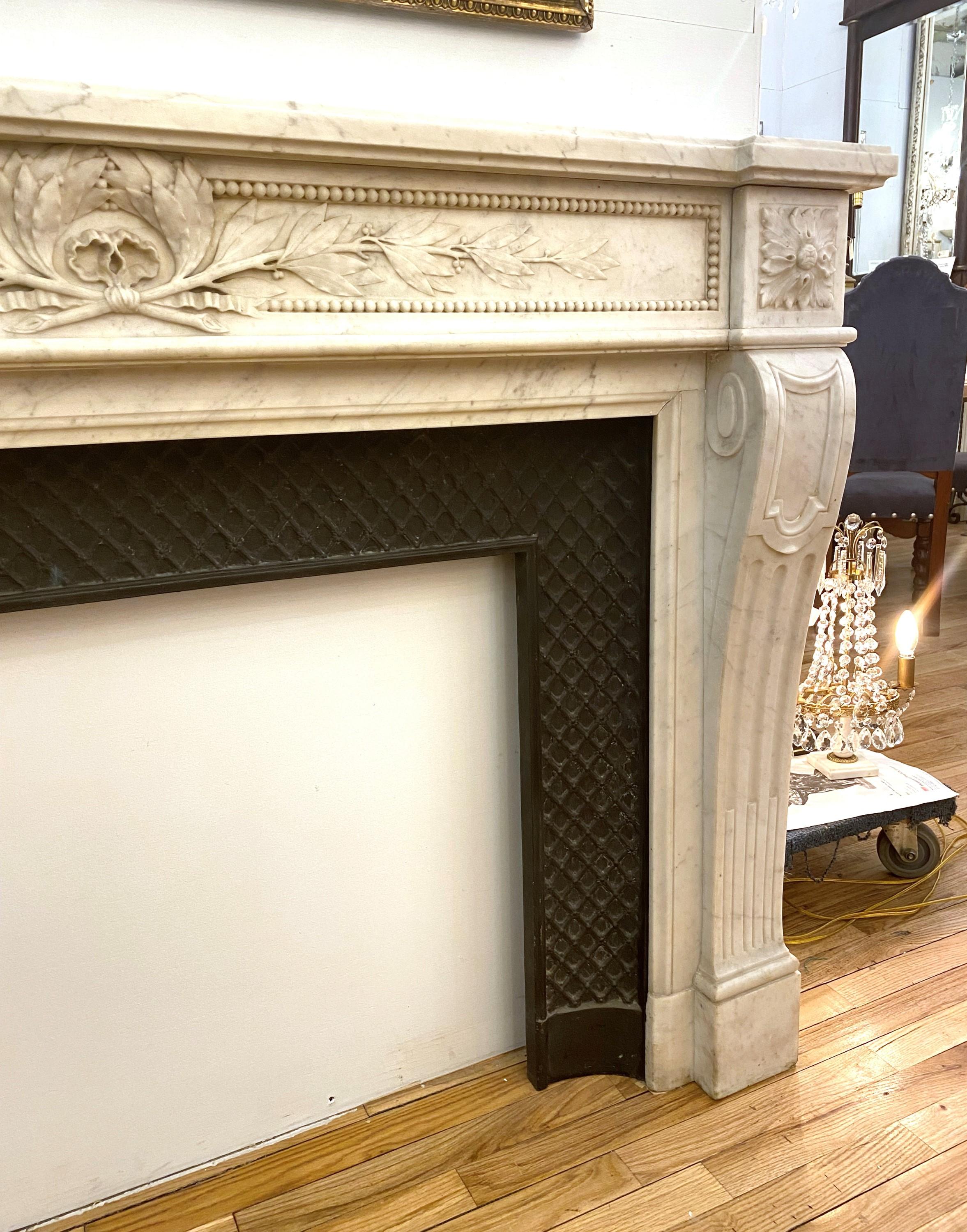 Iron French Louis XVI Carved White Marble Mantel Floral Details For Sale