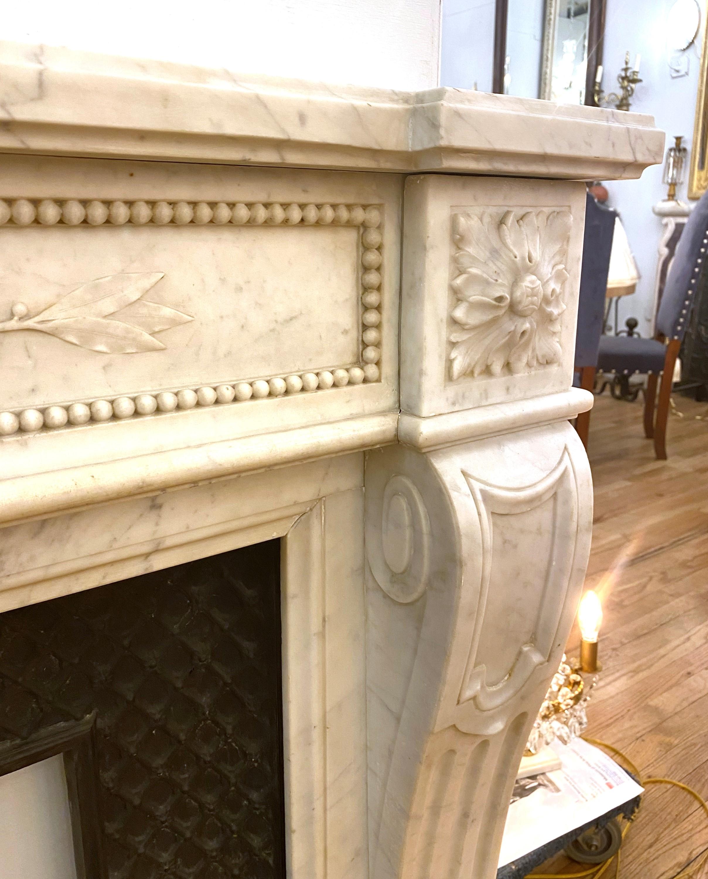 French Louis XVI Carved White Marble Mantel Floral Details For Sale 1