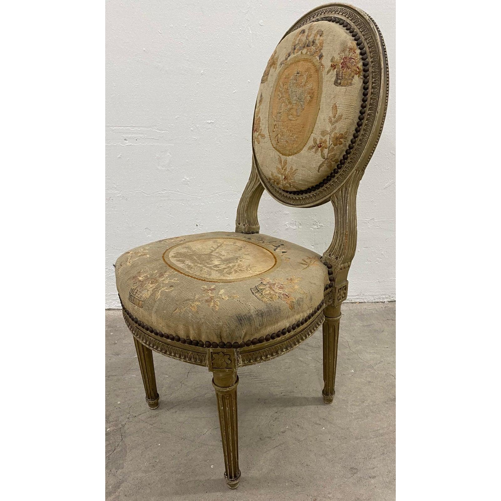 French Louis XVI Child's chair with original Aubusson upholstery, circa 1890

The original Aubusson upholstery is a bit faded after the past 130+ years; the back support shows a dove in a tree and the seat shows a lamb at rest.

Hand carved,