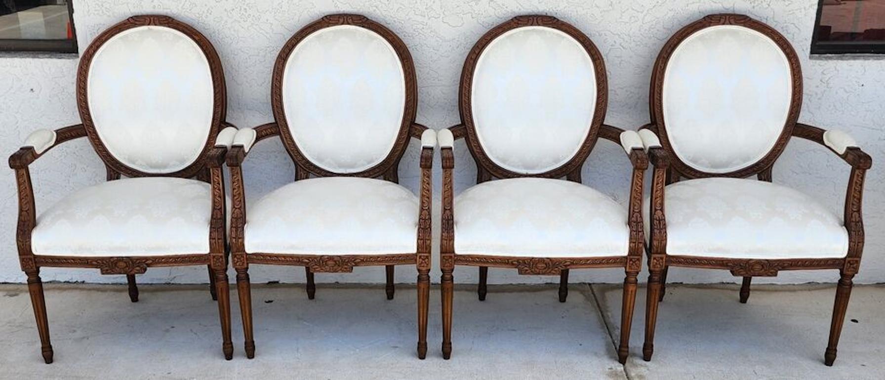 For FULL item description click on CONTINUE READING at the bottom of this page.

Offering One Of Our Recent Palm Beach Estate Fine Furniture Acquisitions Of A
Set of 4 French Louis XVI Style Dining Armchairs
Upholstered in 100% Damask Satin Cotton