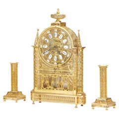 Antique French Louis XVI filigree skeleton clock set 