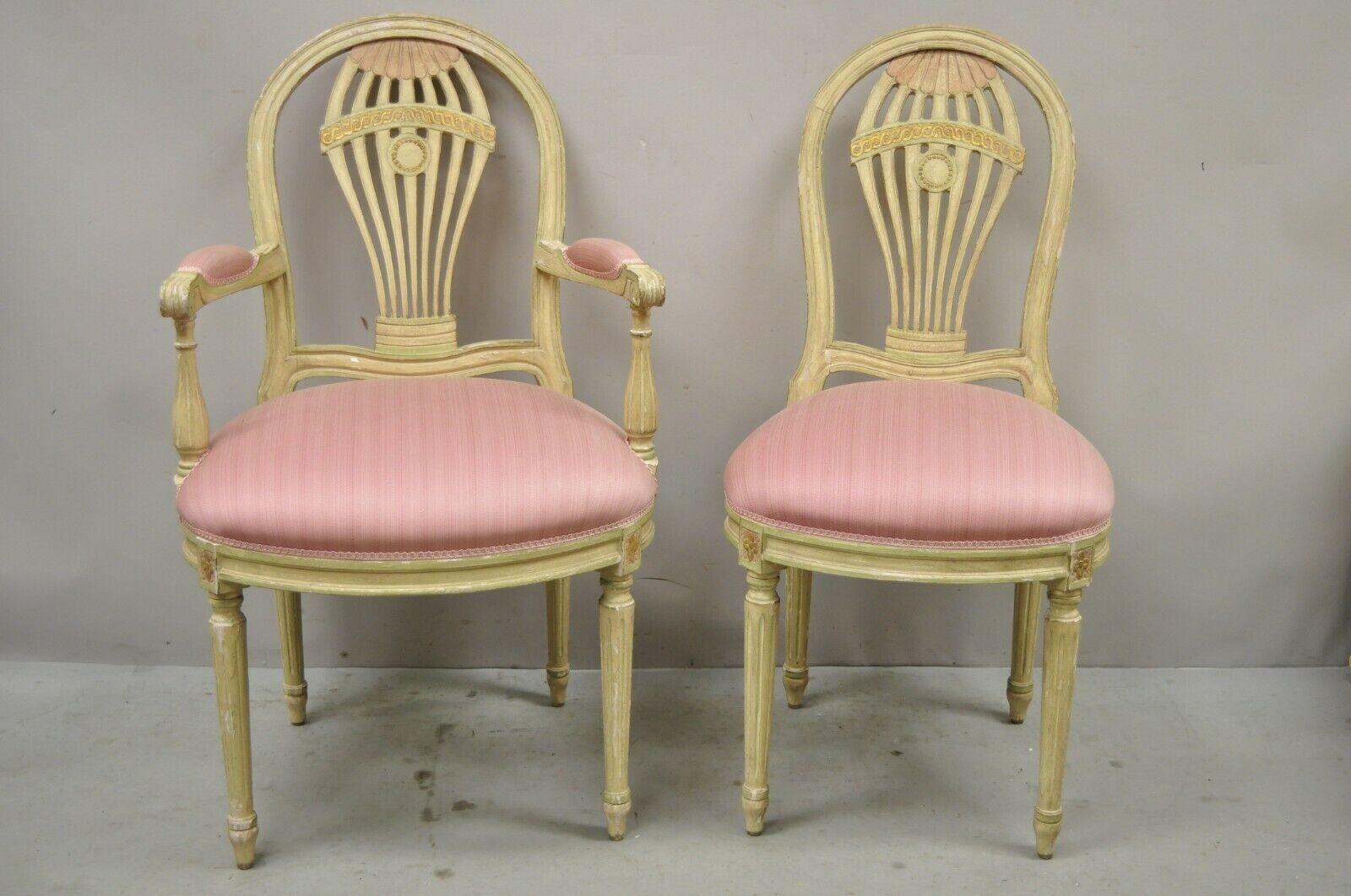 French Louis XVI Style Hot Air Balloon Back Distress Painted Italian dining chairs - Set of 8. Set includes (2) arm chairs, (6) side chairs, distressed cream painted finish, pink upholstered seats with pink painted details to frames, solid wood
