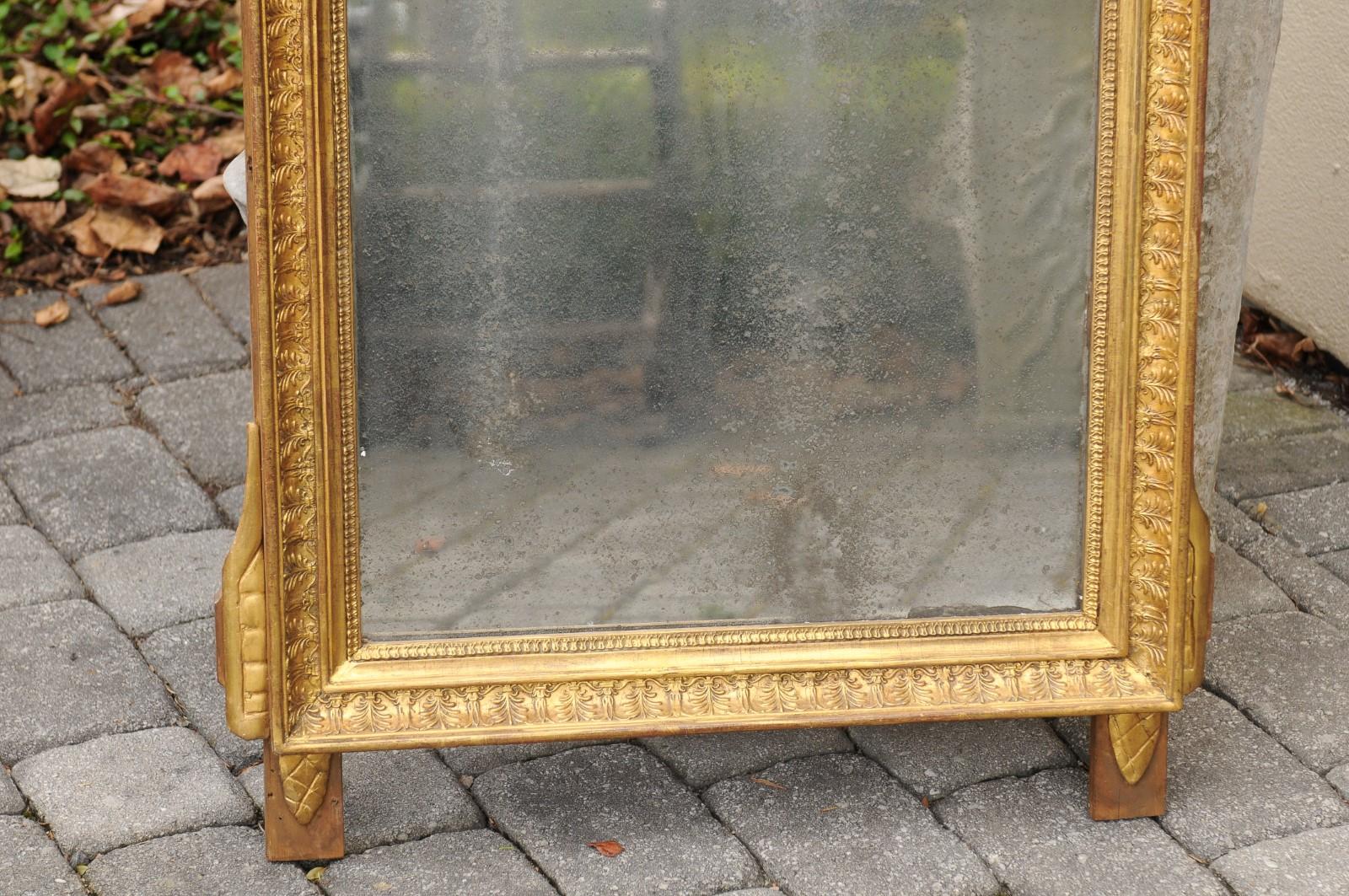 Miroir en bois doré de style Louis XVI, fin du XVIIIe siècle, à motifs d'arts libéraux Bon état - En vente à Atlanta, GA