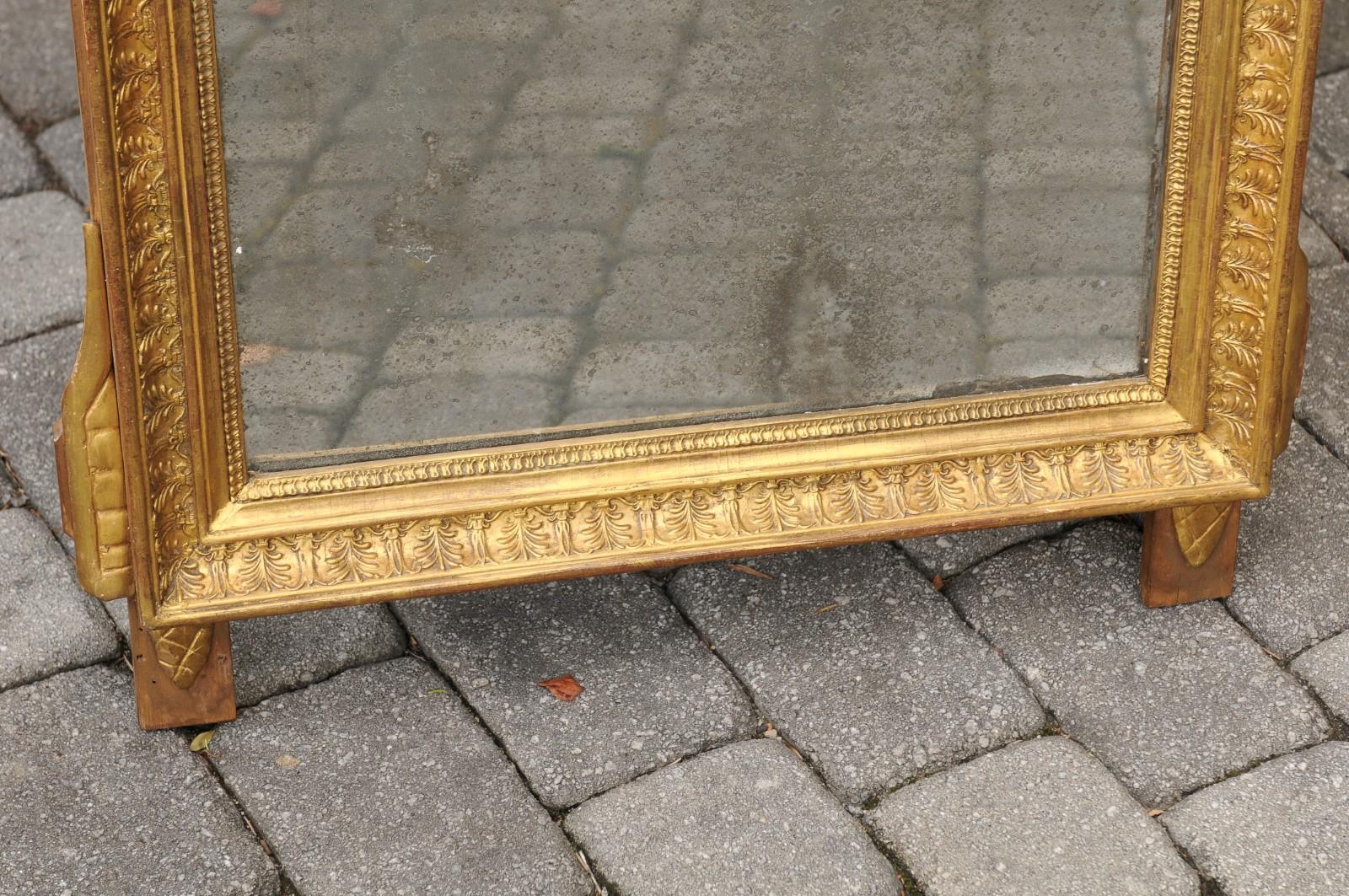 Miroir en bois doré de style Louis XVI, fin du XVIIIe siècle, à motifs d'arts libéraux en vente 2