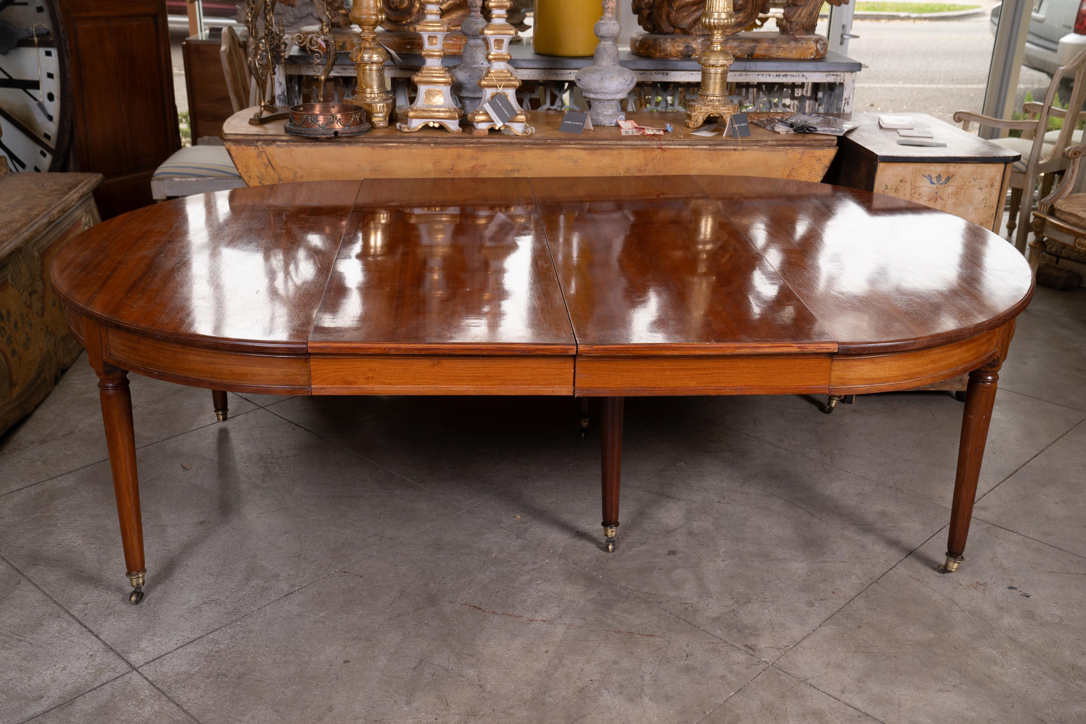 An important and impressive Period Louis XVI Extension Table with 3 finished leaves.The table measures 52”x 57.5 which is a fat oval shape when it is not extended.. Each of the 3 leaves is 19.75 so it is a very versatile table that can be used in