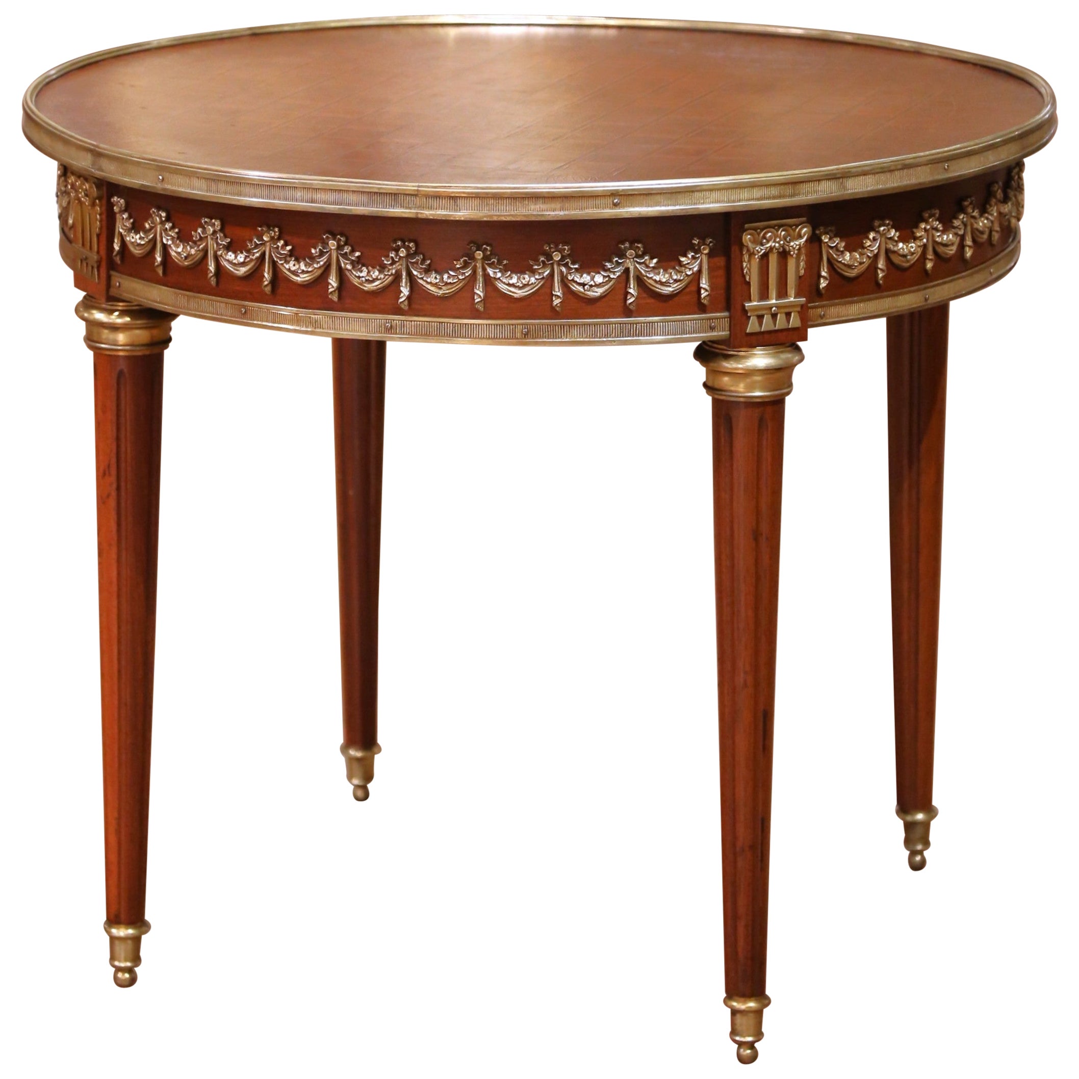 Guéridon français Louis XVI en acajou avec dessus en marqueterie et montures en bronze en vente