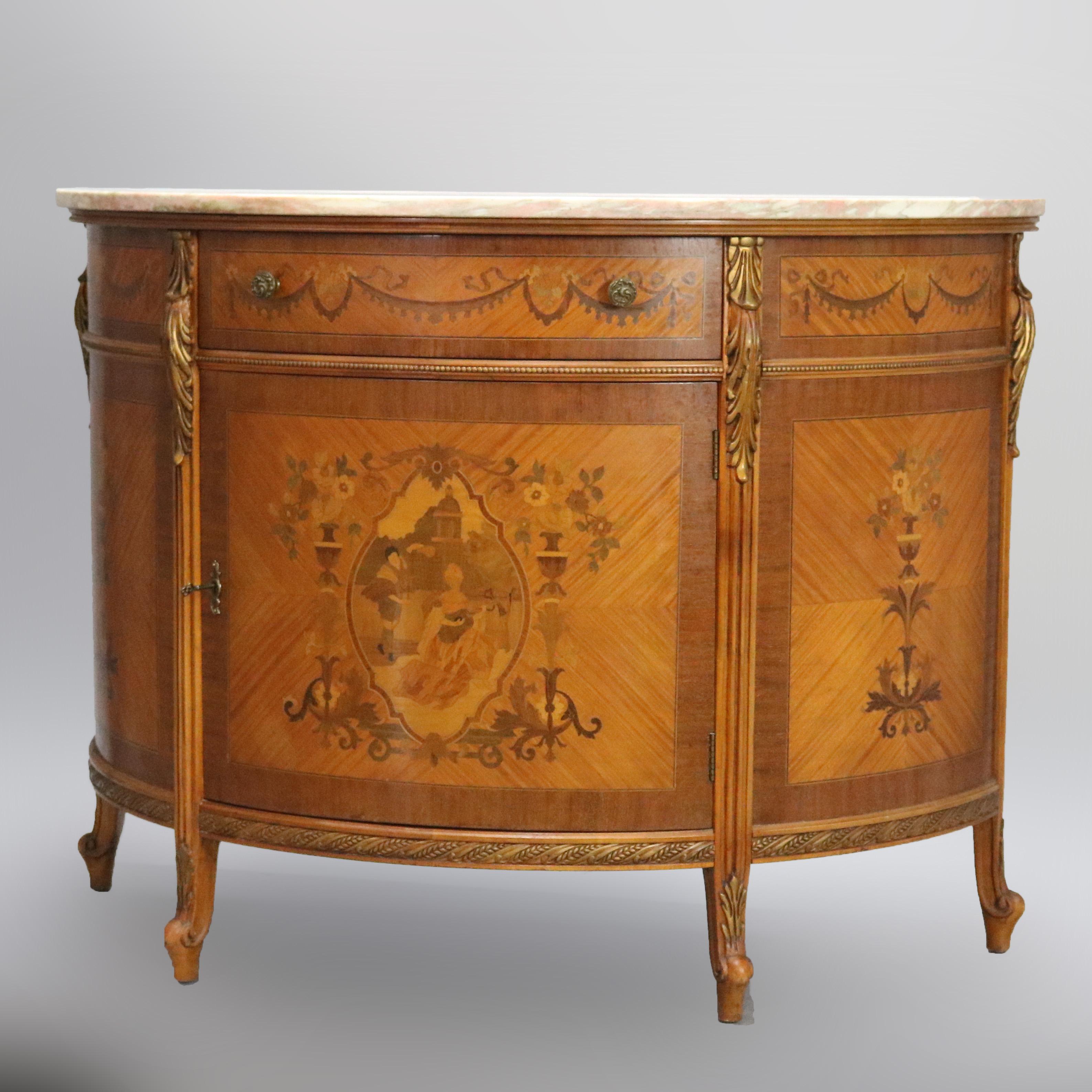 An antique French Louis XVI credenza offers demilune form with marble top surmounting mahogany and satinwood inlaid case with frieze drawer over single door lower cabinet with Dutch marquetry foliate, garland, panier de fleurs and central courting
