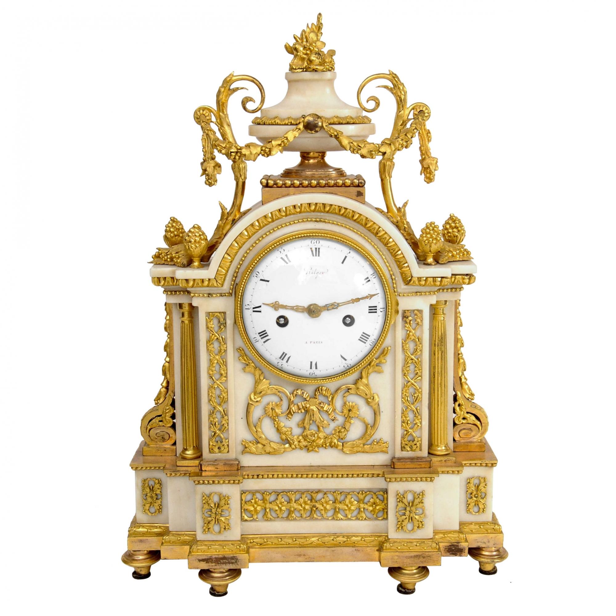 French Louis XVI Ormolu-Mounted Marble Mantel Clock, circa 1780. 
Enamel dial with Roman numerals, signed in red 'Hilger A Paris', fine pierced engraved gilt hands, 8-day anchor movement with silk suspended pendulum and countwheel half hour striking