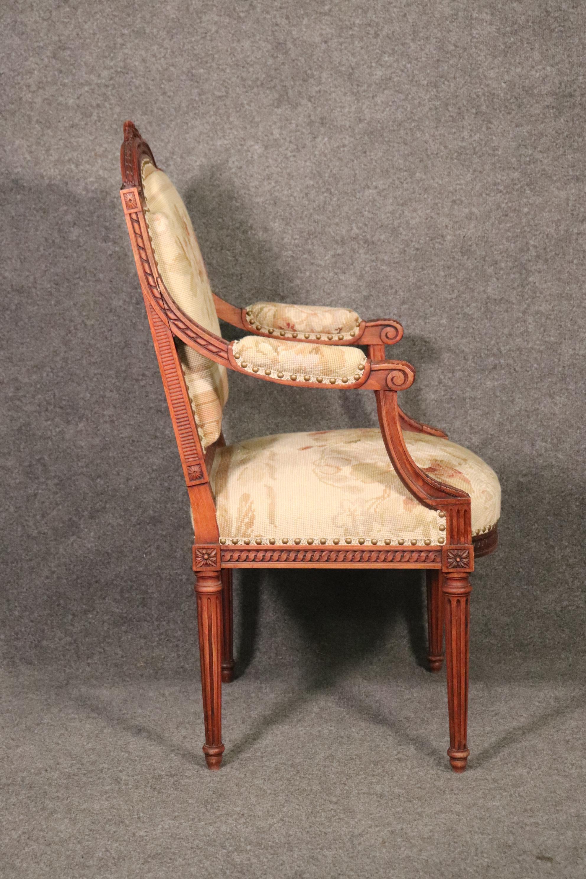 Carved French Louis XVI Needlepoint Fauteuil Armchair in Walnut, circa 1890 For Sale