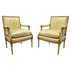 Poltrone francesi Luigi XVI neoclassiche in seta dorata Fauteuil Parcel - una coppia