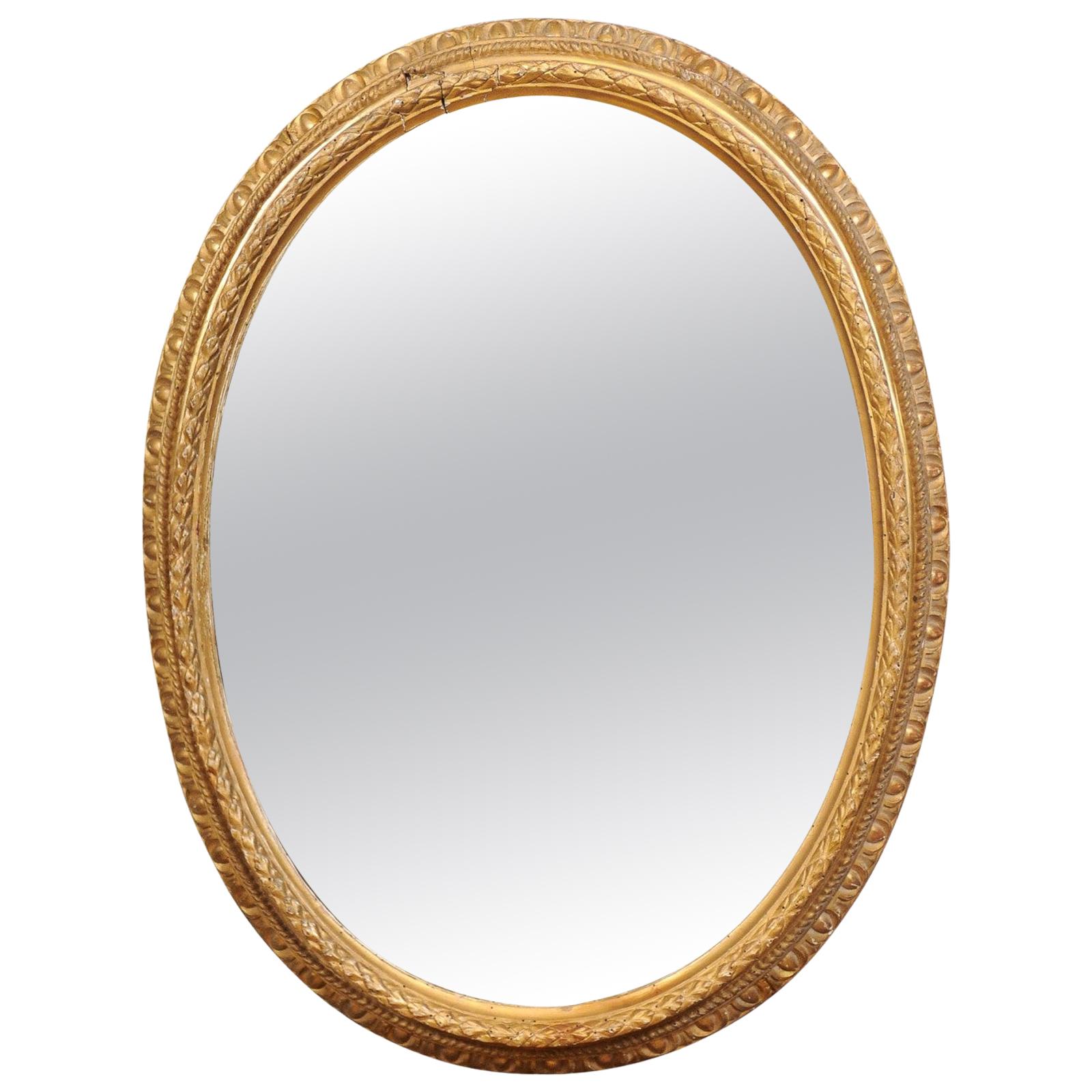 French Louis XVI Oval Giltwood Mirror, Late 18th Century