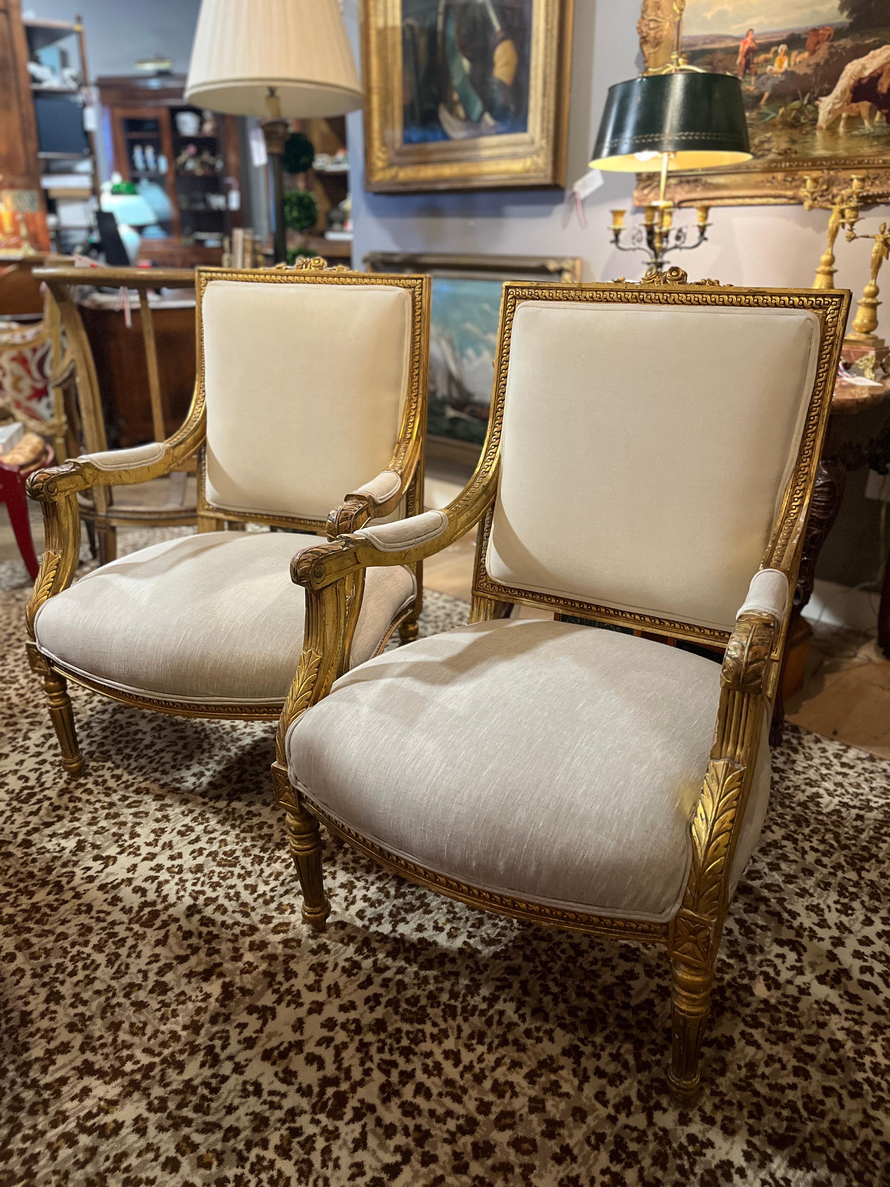French Louis XVI Pair of Gilt Fauteuils a La Reine 
Beautiful Pair purchased in France. Age appropriate wear, see detailed photos or message us with questions. 