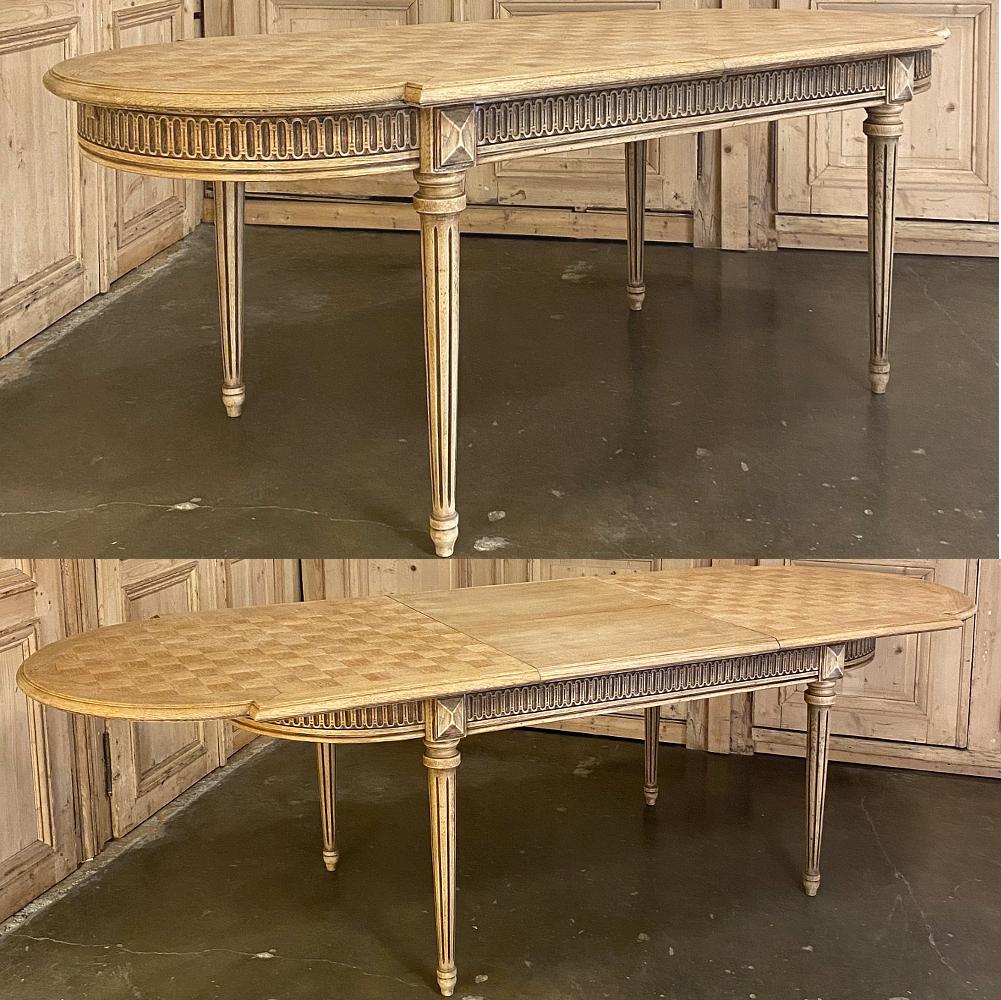 French Louis XVI Parquet pop leaf dining table is an amazingly versatile table with timeless lines that hark back to the master architects of ancient Greece and Rome! Louis XVI is responsible for the 18th century revival of the style, evidenced in