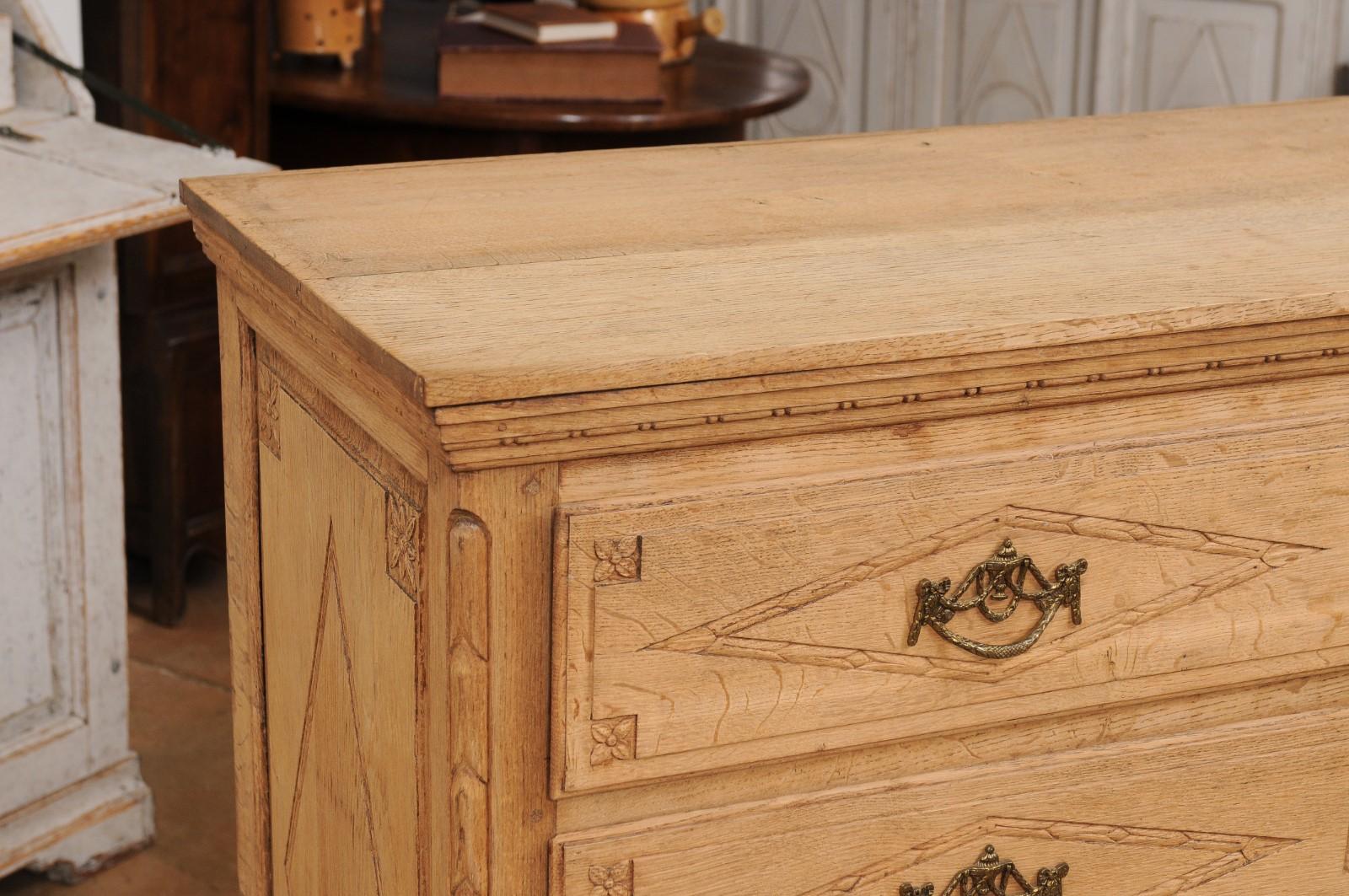 18th Century French Louis XVI Period 1790s Natural Oak Four-Drawer Commode with Carved Décor For Sale