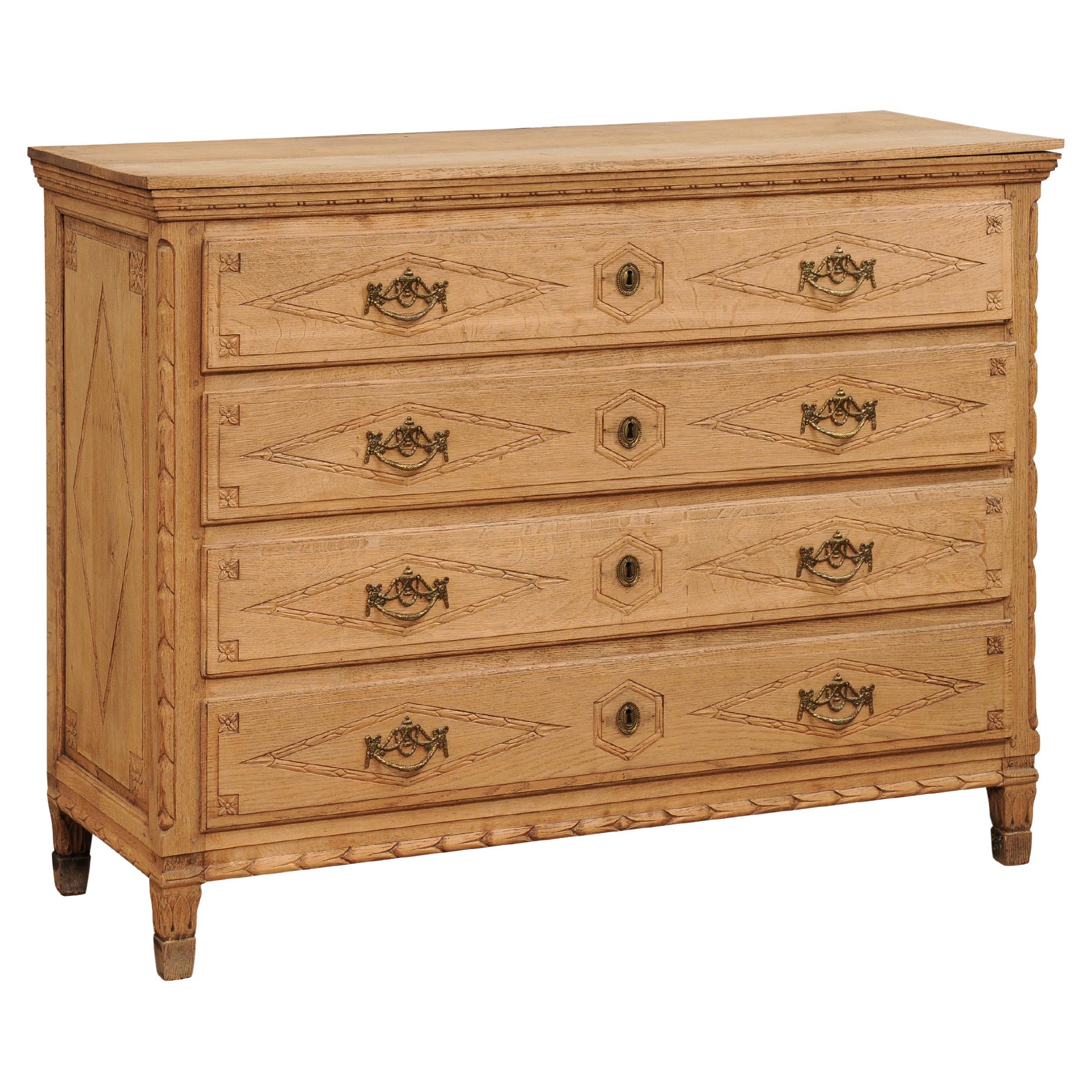 French Louis XVI Period 1790s Natural Oak Four-Drawer Commode with Carved Décor For Sale