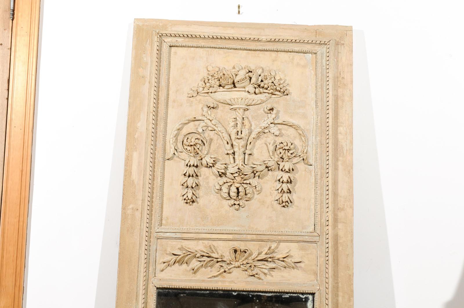 18th Century French Louis XVI Period 1790s Painted Wood Trumeau Mirror with Scrollwork Motifs For Sale