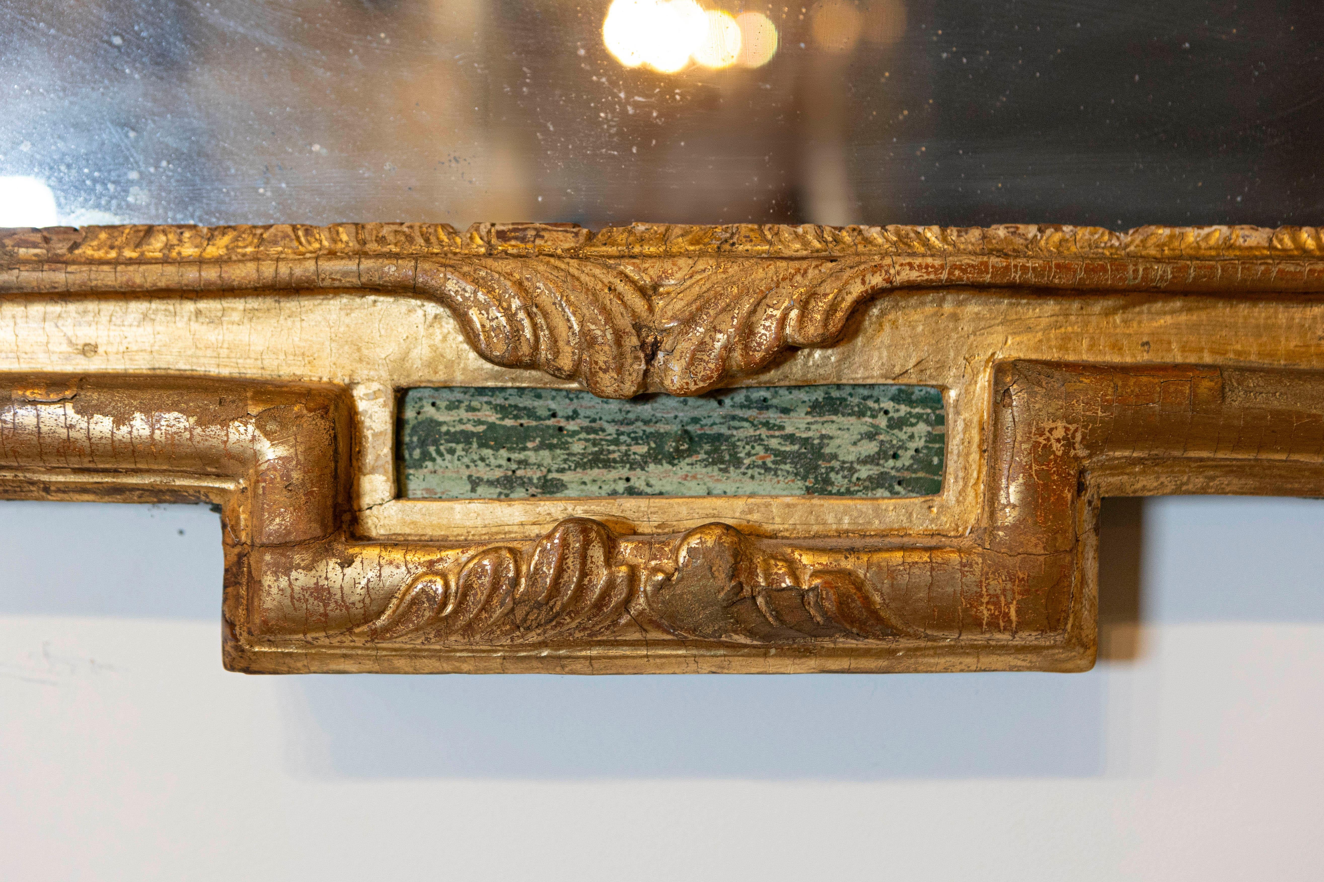 Sculpté Miroir doré d'époque Louis XVI du 18ème siècle avec allégorie musicale sculptée en vente