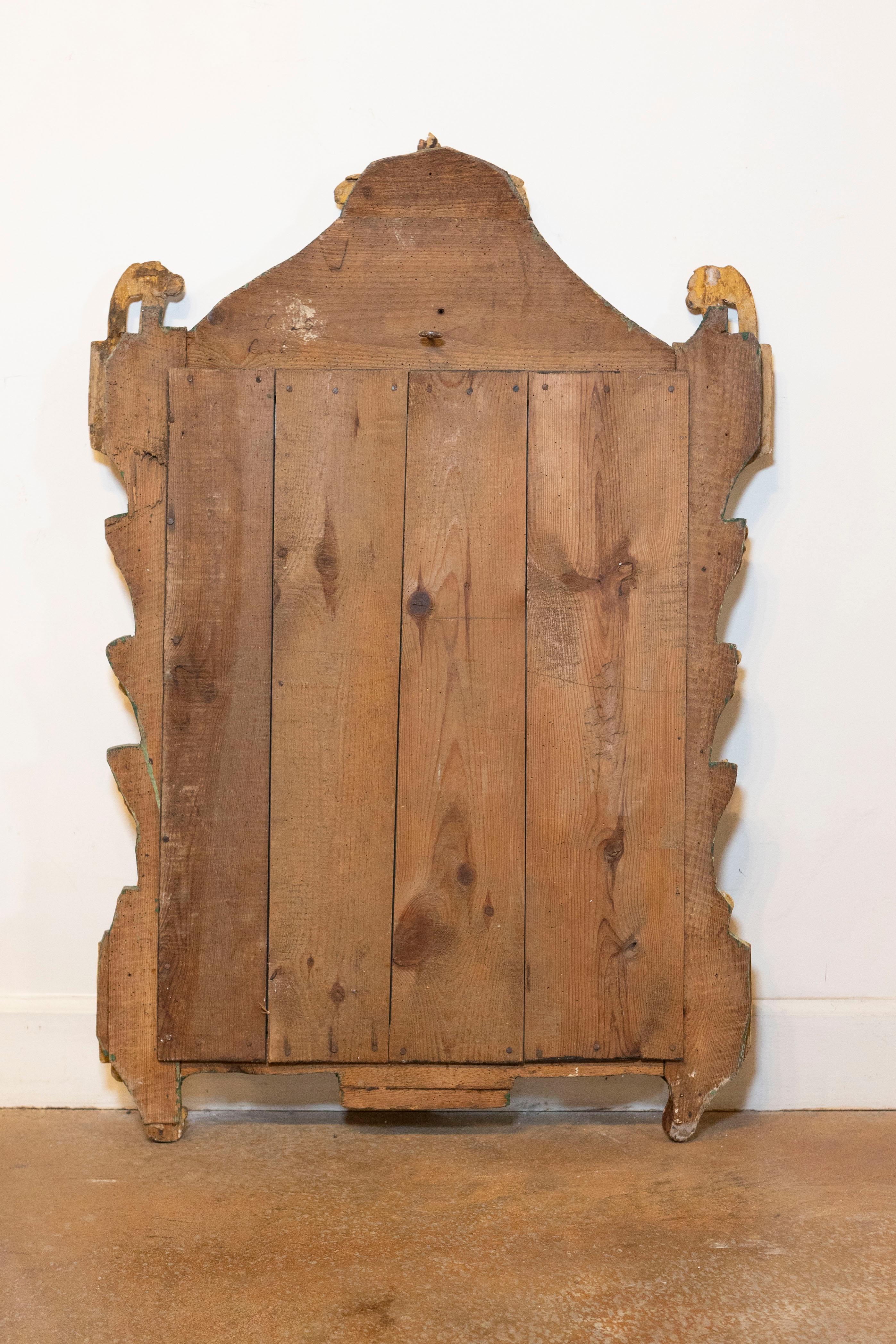 Miroir doré d'époque Louis XVI du 18ème siècle avec allégorie musicale sculptée en vente 2