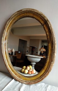 French Louis XVI Period Carved Oval Mirror