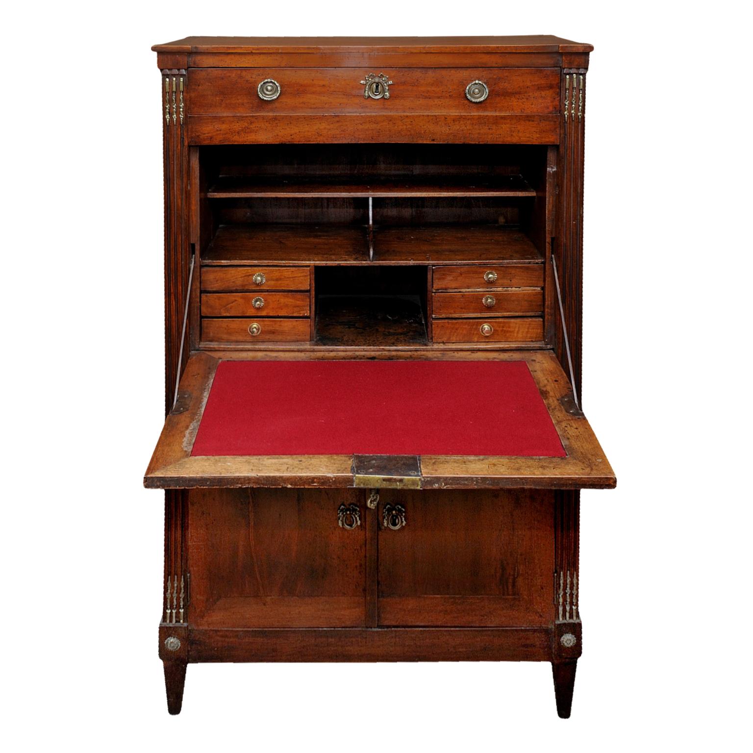 This is a rather stylish French country neoclassical Louis XVI period cherrywood late 18th century Secretaire a Abattant of very useful proportions.
Complete with brass mounts and two-door shelved cupboard below, fitted interior with frieze drawer