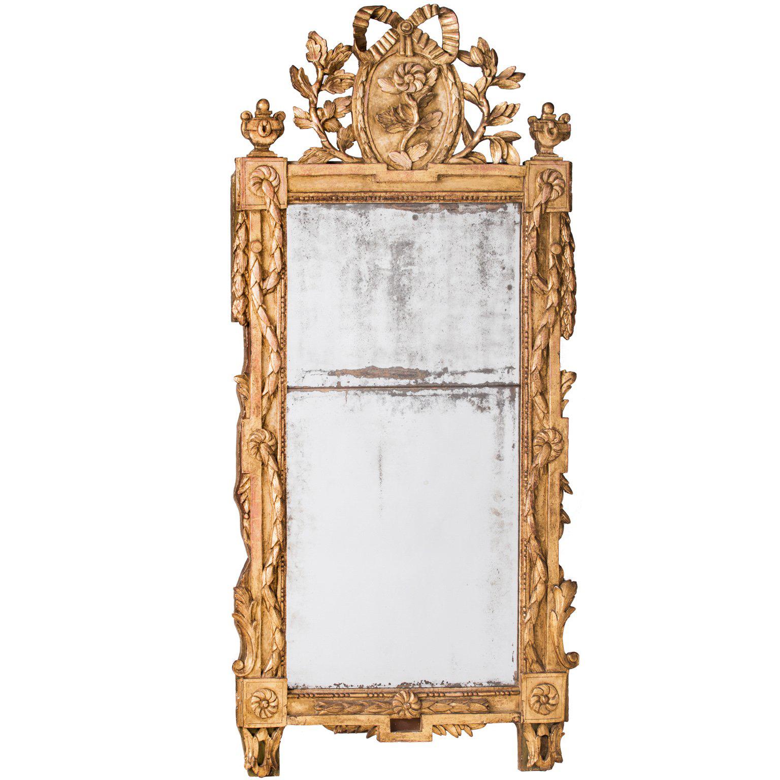 French Louis XVI Period Giltwood Mirror with Bow For Sale