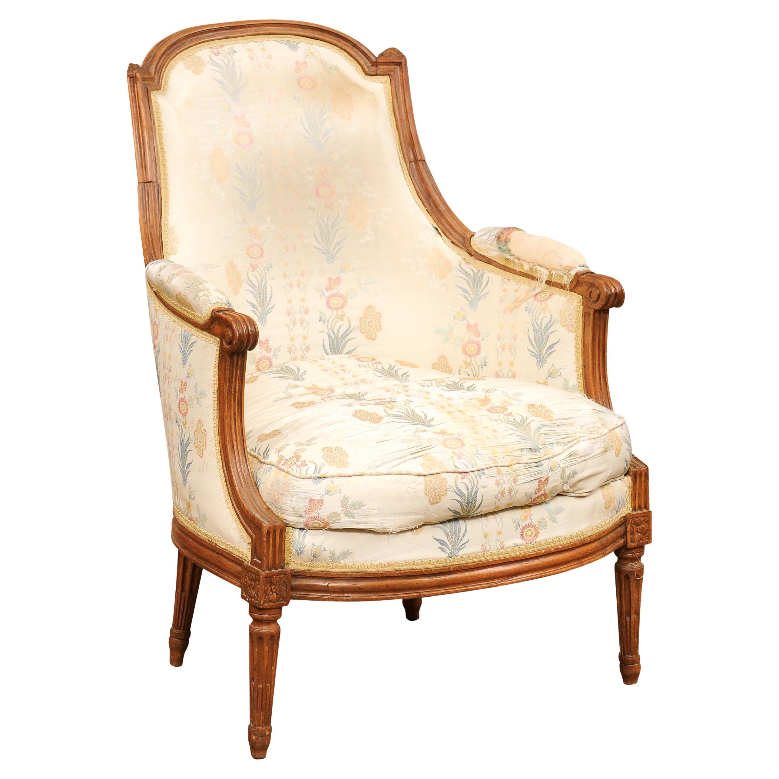 French Louis XVI Period Late 18th Century Walnut Bergère Chair with Curving Back For Sale