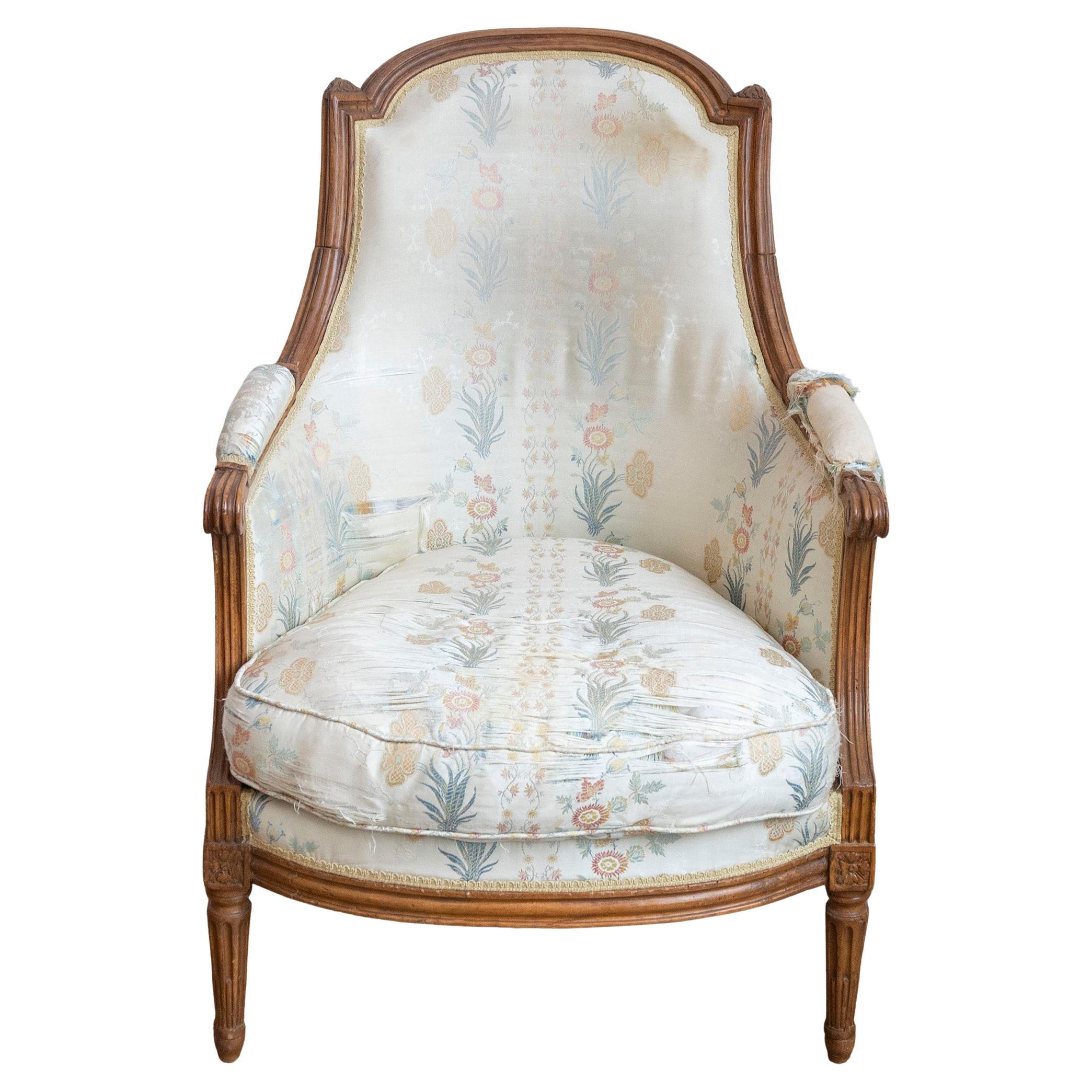 French Louis XVI Period Late 18th Century Walnut Bergère Chair with Curving Back