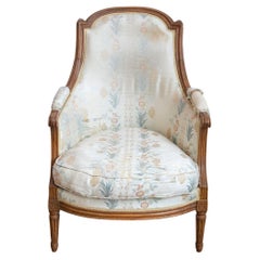French Louis XVI Period Late 18th Century Walnut Bergère Chair with Curving Back