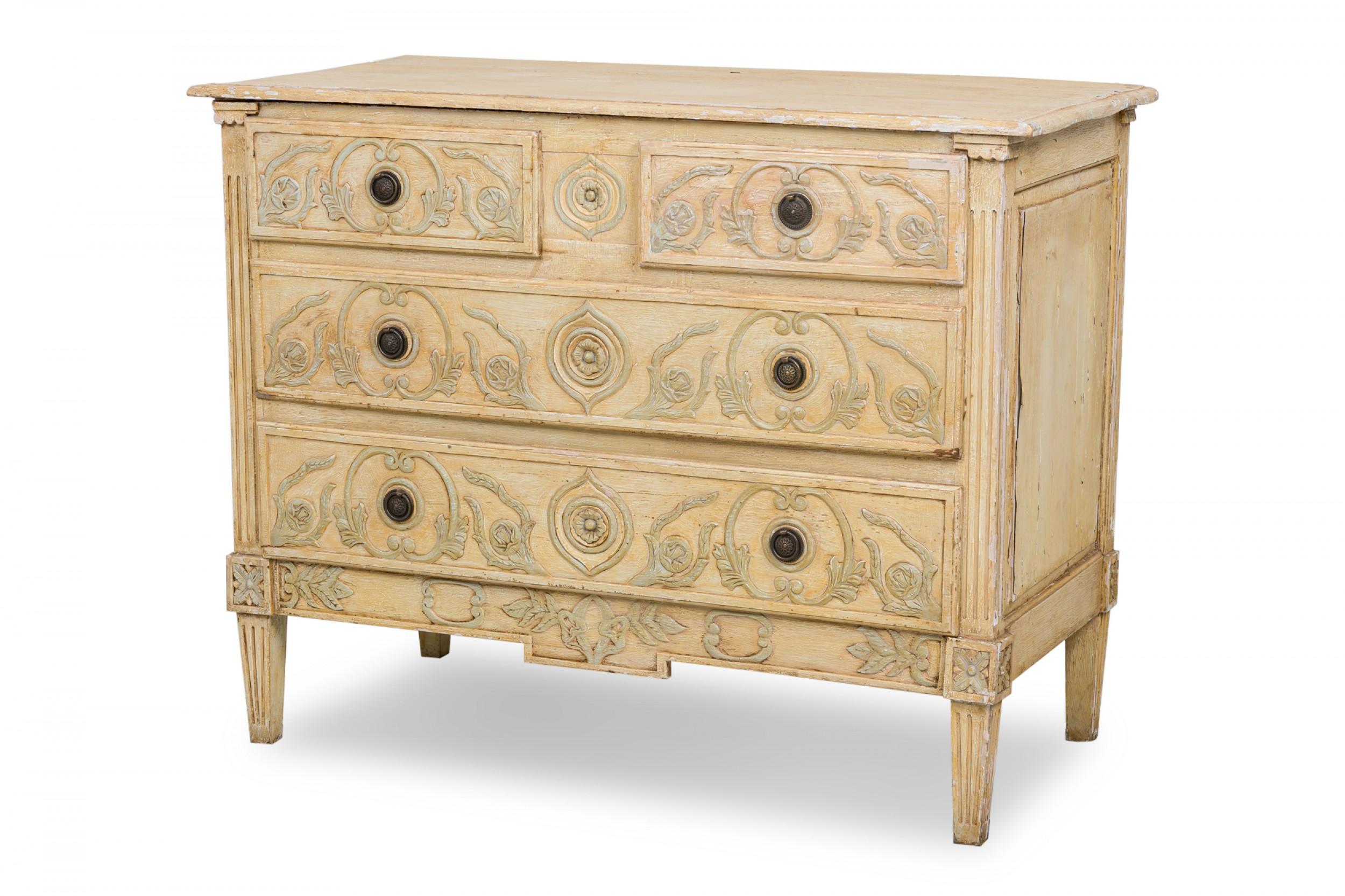 French Louis XVI Provincial commode with a painted beige and gray finish, two smaller upper drawers and two wider lower drawers with antiqued bronze ring drawer pulls.