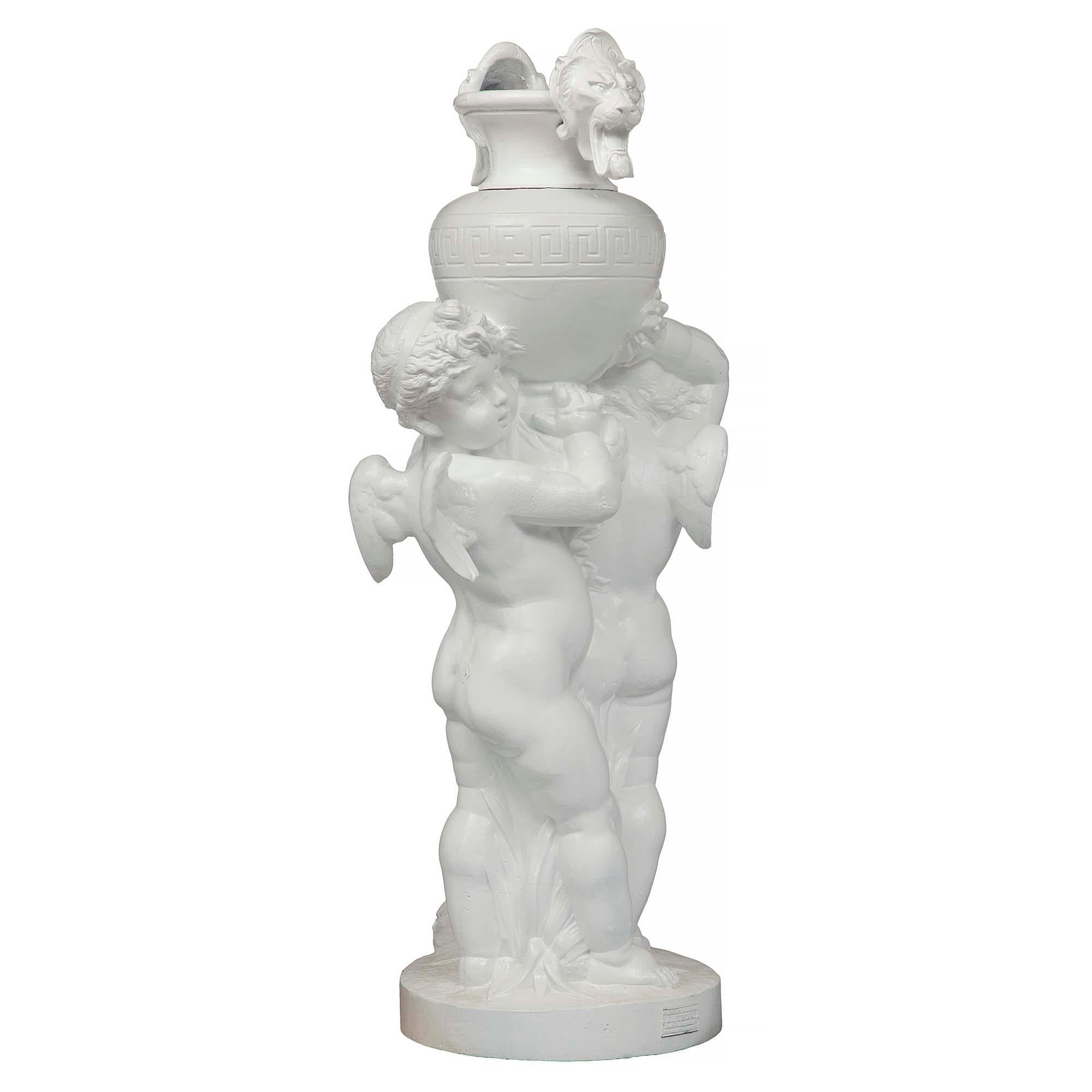 French Louis XVI St. 19th Century Cast Iron Grouping of Two Winged Cherubs In Good Condition For Sale In West Palm Beach, FL
