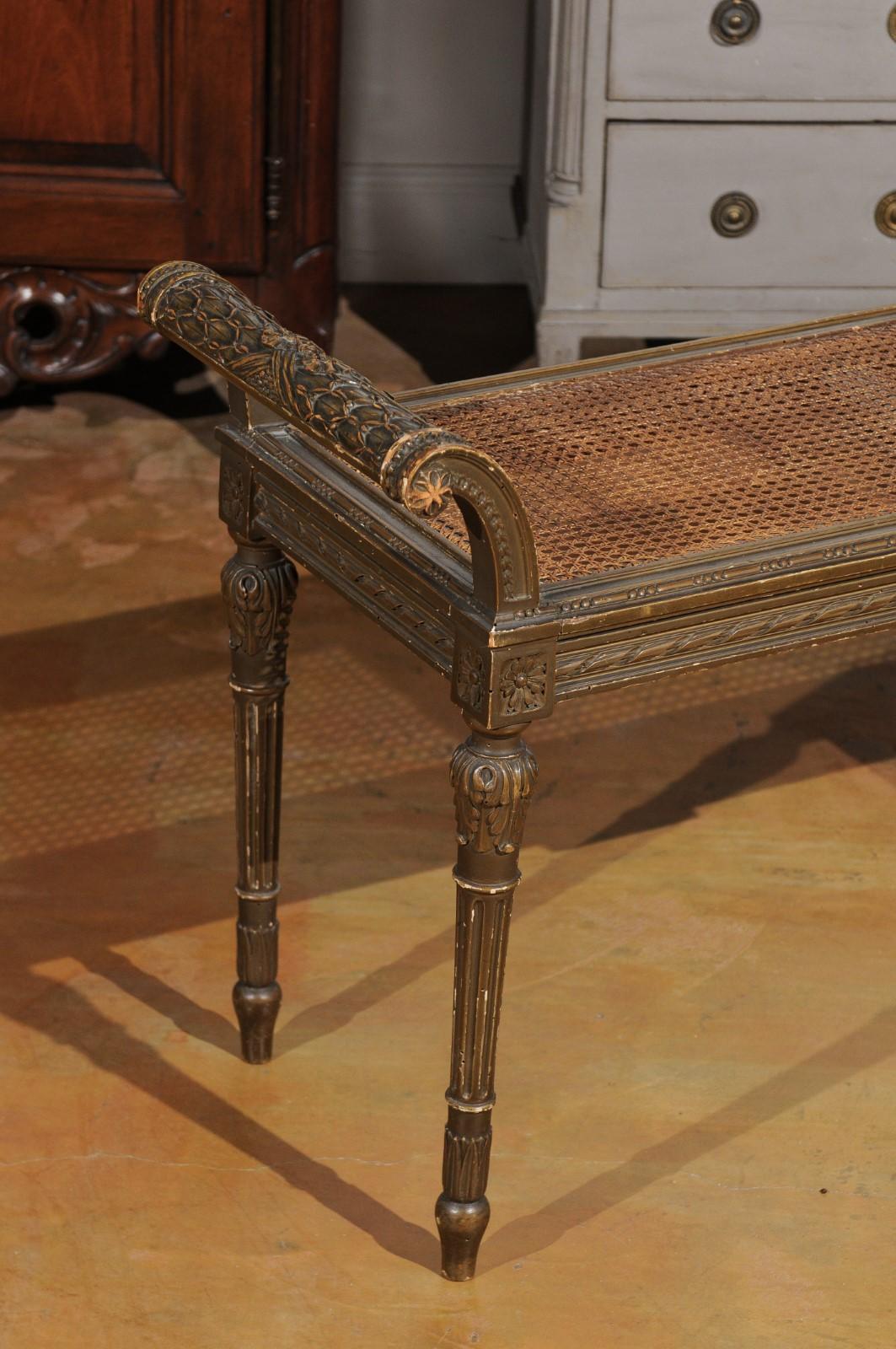 19th Century French Louis XVI Style 1880s Carved Bench with Cane Seat and Scrolling Arms