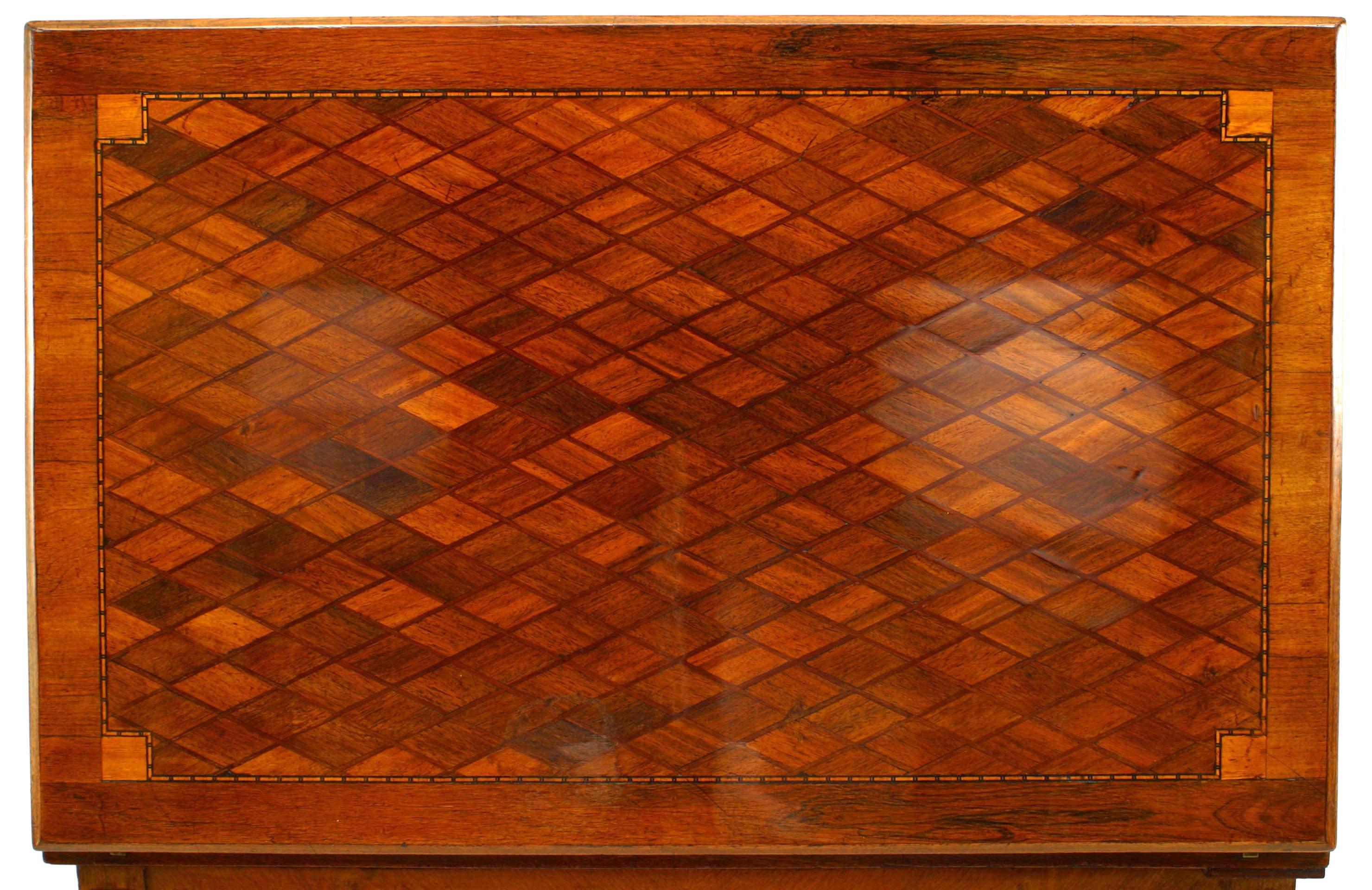 French Louis XVI style (19th Century) fruitwood and parquetry inlaid rectangular flip top game table having a backgammon, dice, and roulette wheel interior well
