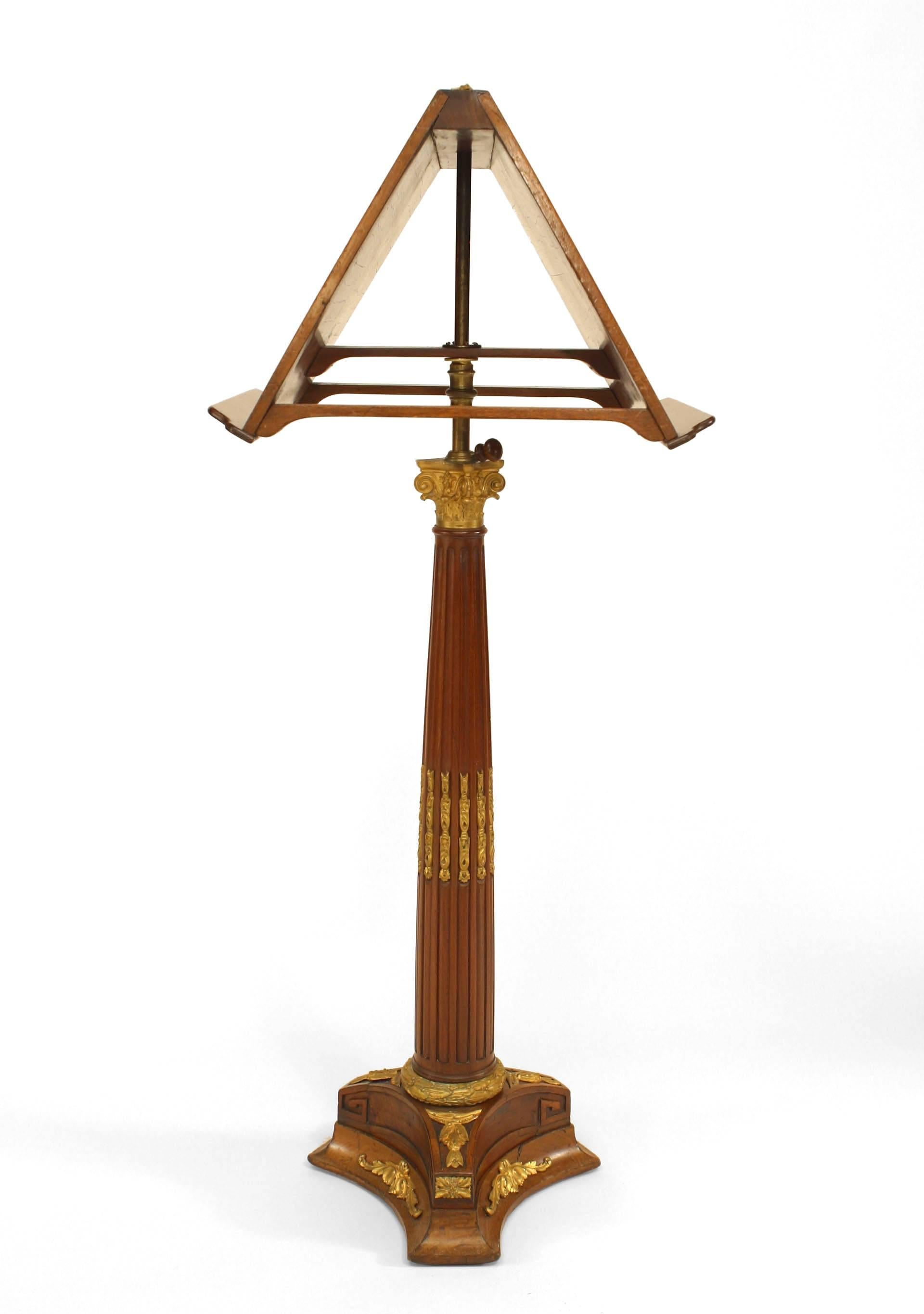 French Louis XVI style (19th Cent) mahogany and gilt bronze trimmed pedestal base double sided (duet) adjustable music stand with fluted column.

