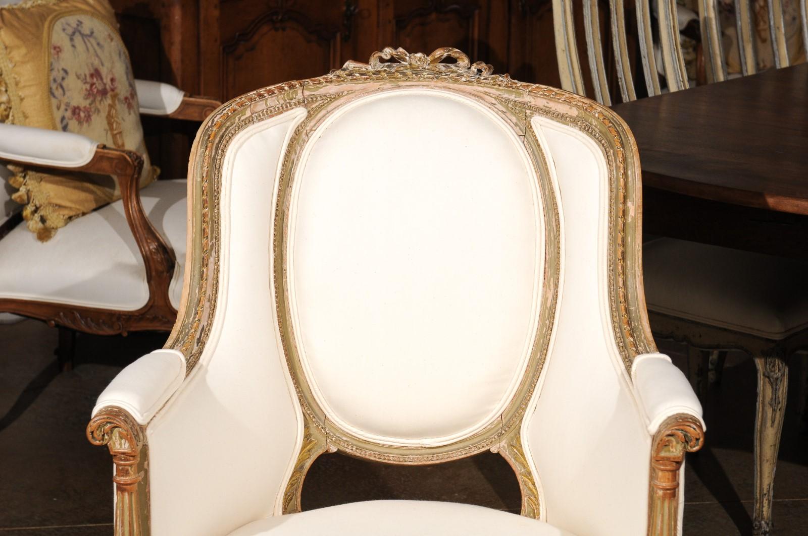 French Louis XVI Style 19th Century Bergère Chair with Distressed Finish In Good Condition In Atlanta, GA