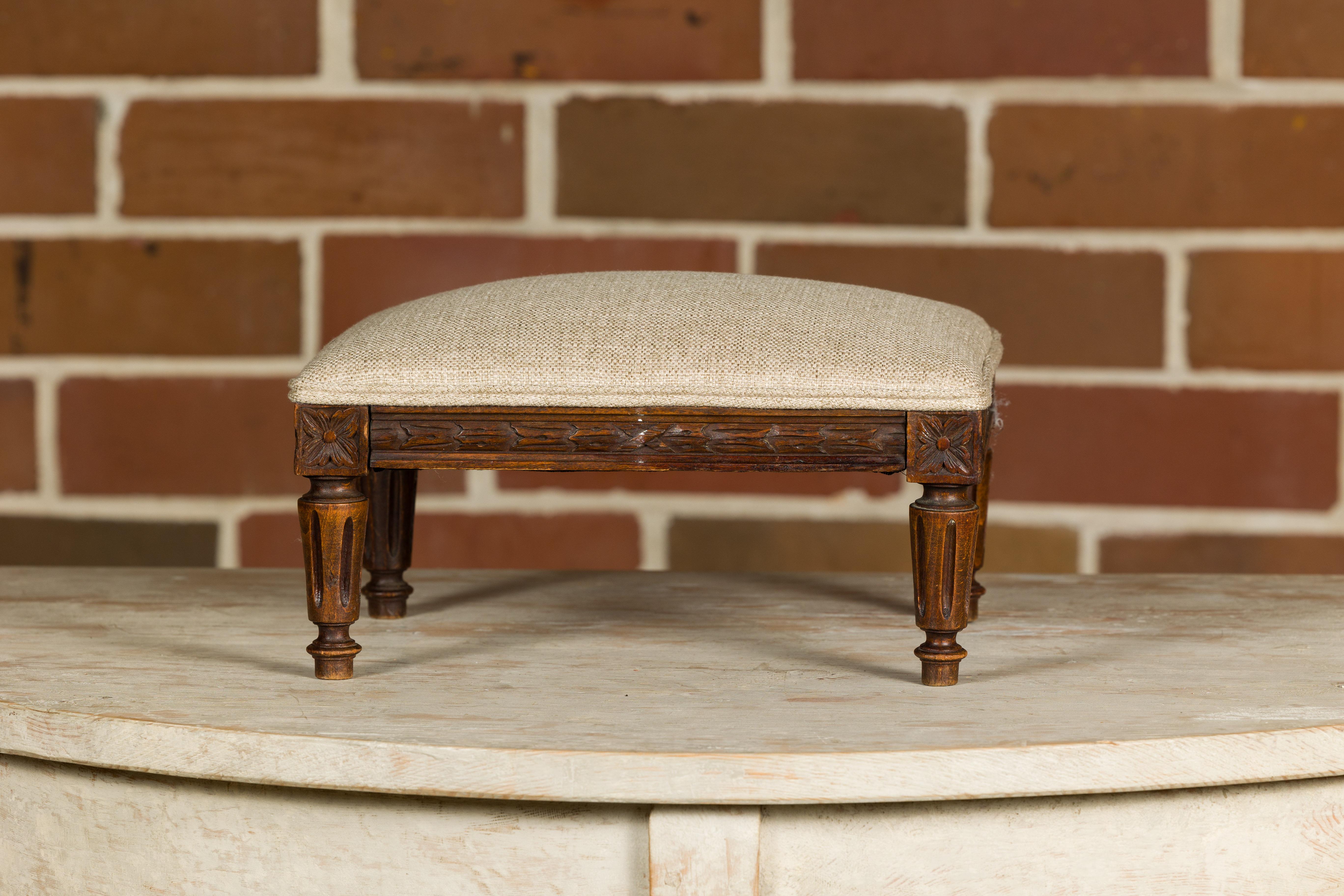 French Louis XVI Style 19th Century Footstool with Carved Décor and Fluted Legs In Good Condition For Sale In Atlanta, GA