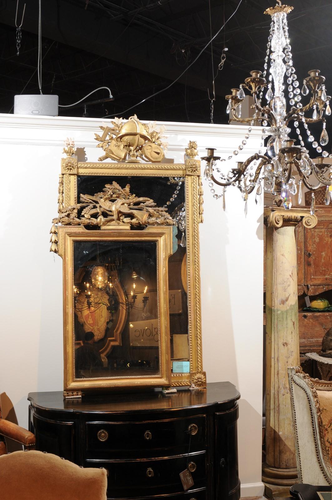 French Louis XVI Style 19th Century Gilt Mirror with Hunting Theme Carved Crest In Distressed Condition In Atlanta, GA