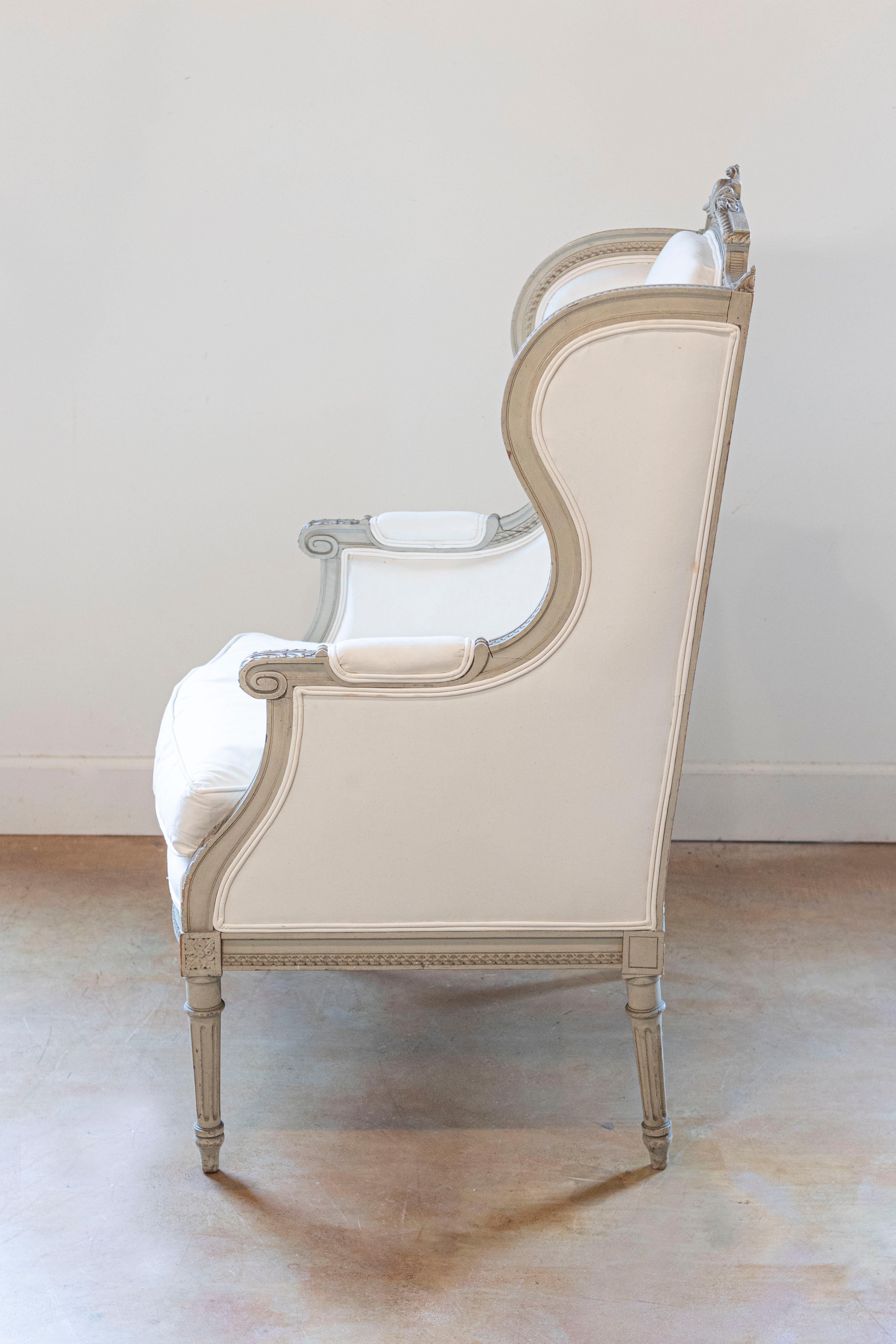 Upholstery French Louis XVI Style 19th Century Painted and Carved Wingback Bergère Chair For Sale