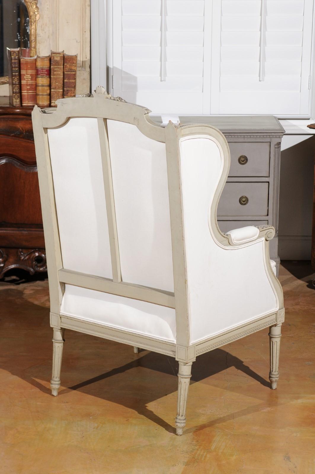 Upholstery French Louis XVI Style 19th Century Painted and Carved Wingback Bergère Chair For Sale