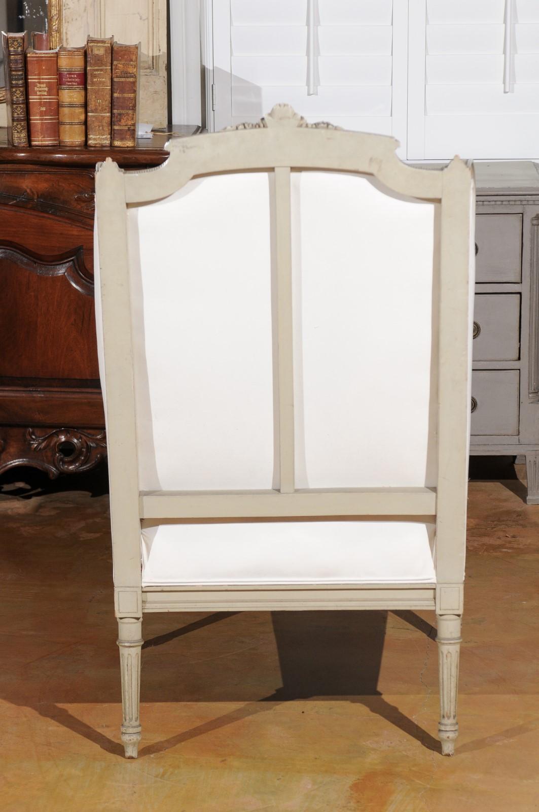 French Louis XVI Style 19th Century Painted and Carved Wingback Bergère Chair For Sale 1