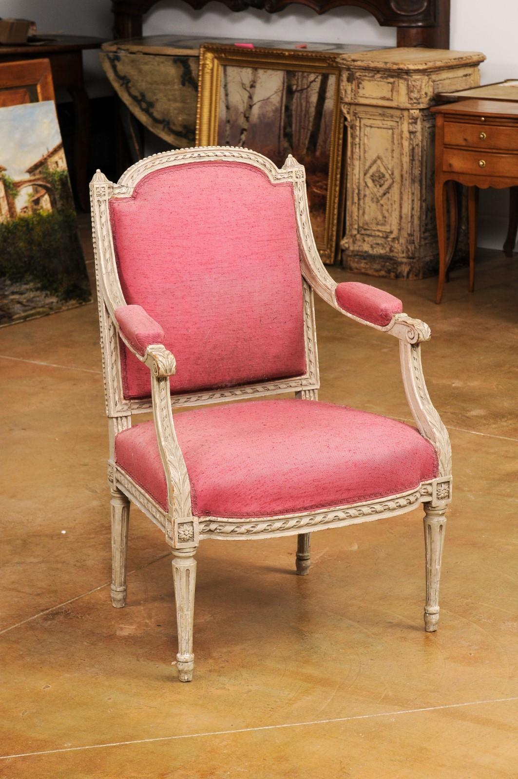 French Louis XVI Style 19th Century Painted Fauteuil with Abundant Carved Décor In Good Condition For Sale In Atlanta, GA