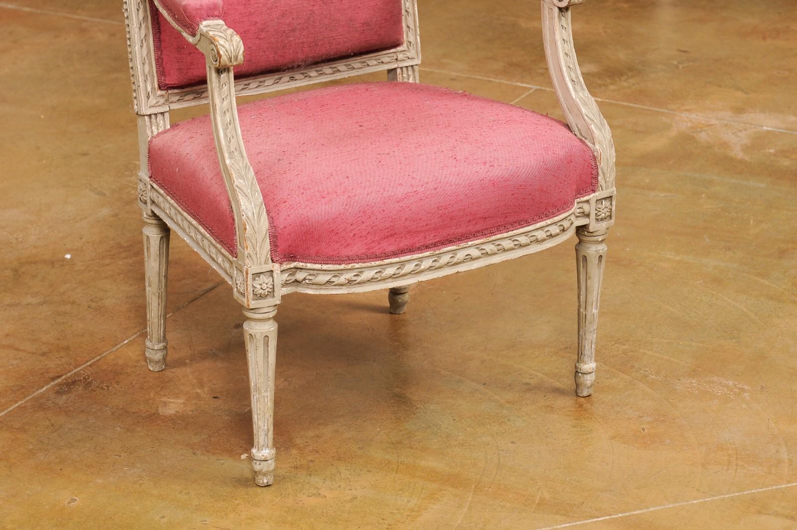 Upholstery French Louis XVI Style 19th Century Painted Fauteuil with Abundant Carved Décor For Sale