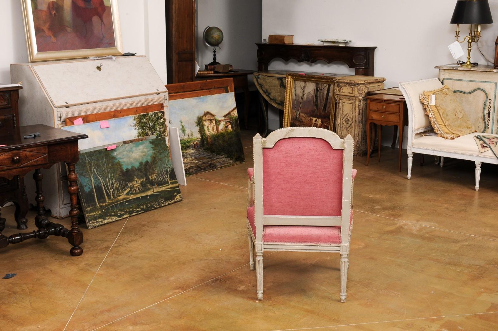 French Louis XVI Style 19th Century Painted Fauteuil with Abundant Carved Décor For Sale 4
