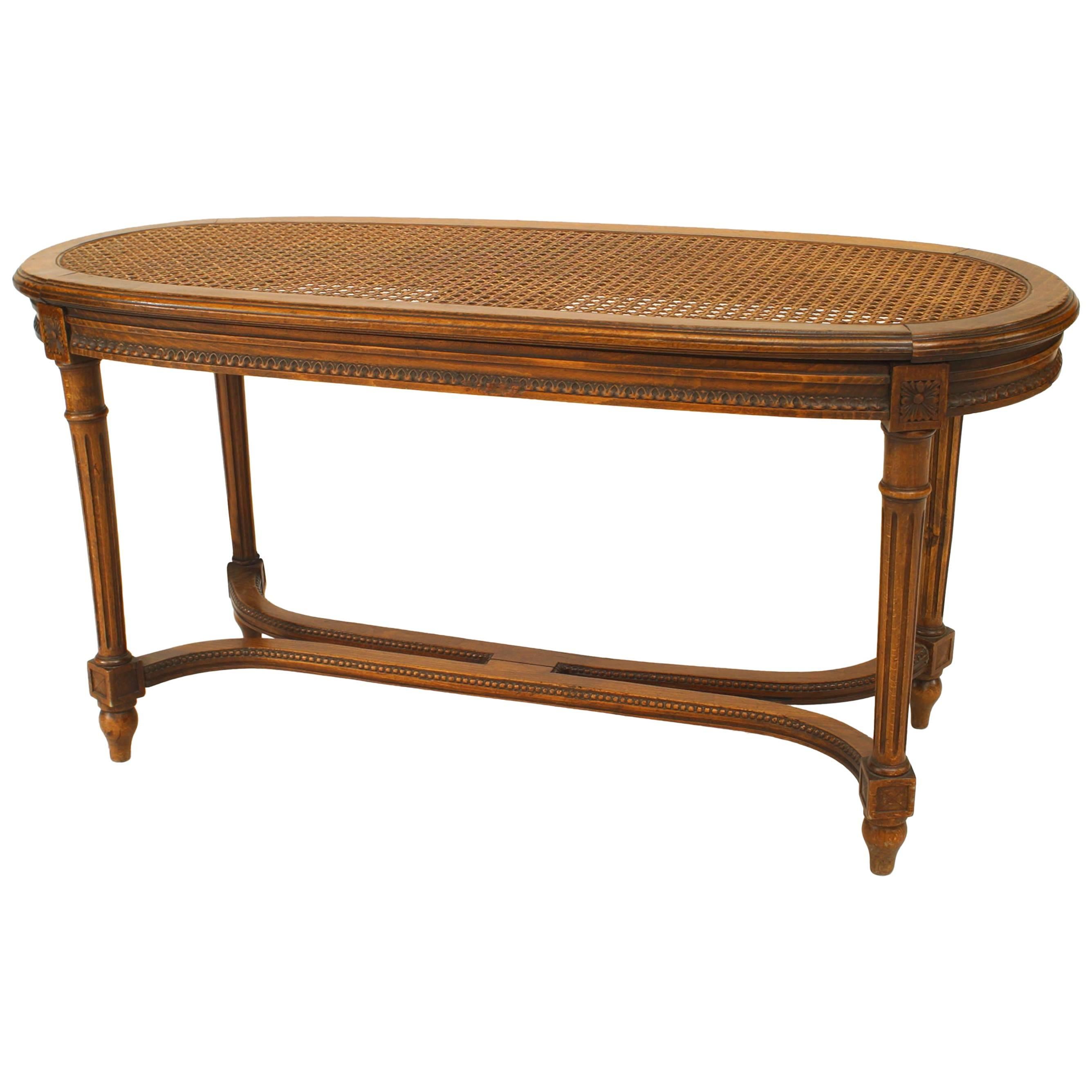 French Louis XVI Style Walnut Bench with Cane Seat For Sale