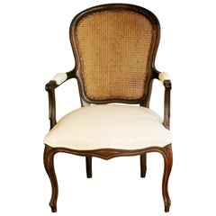 French Louis XVI Style Armchair Carved Walnut with Caned Backrest