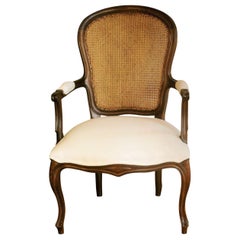 French Louis XVI Style Armchair Carved Walnut with Caned Backrest
